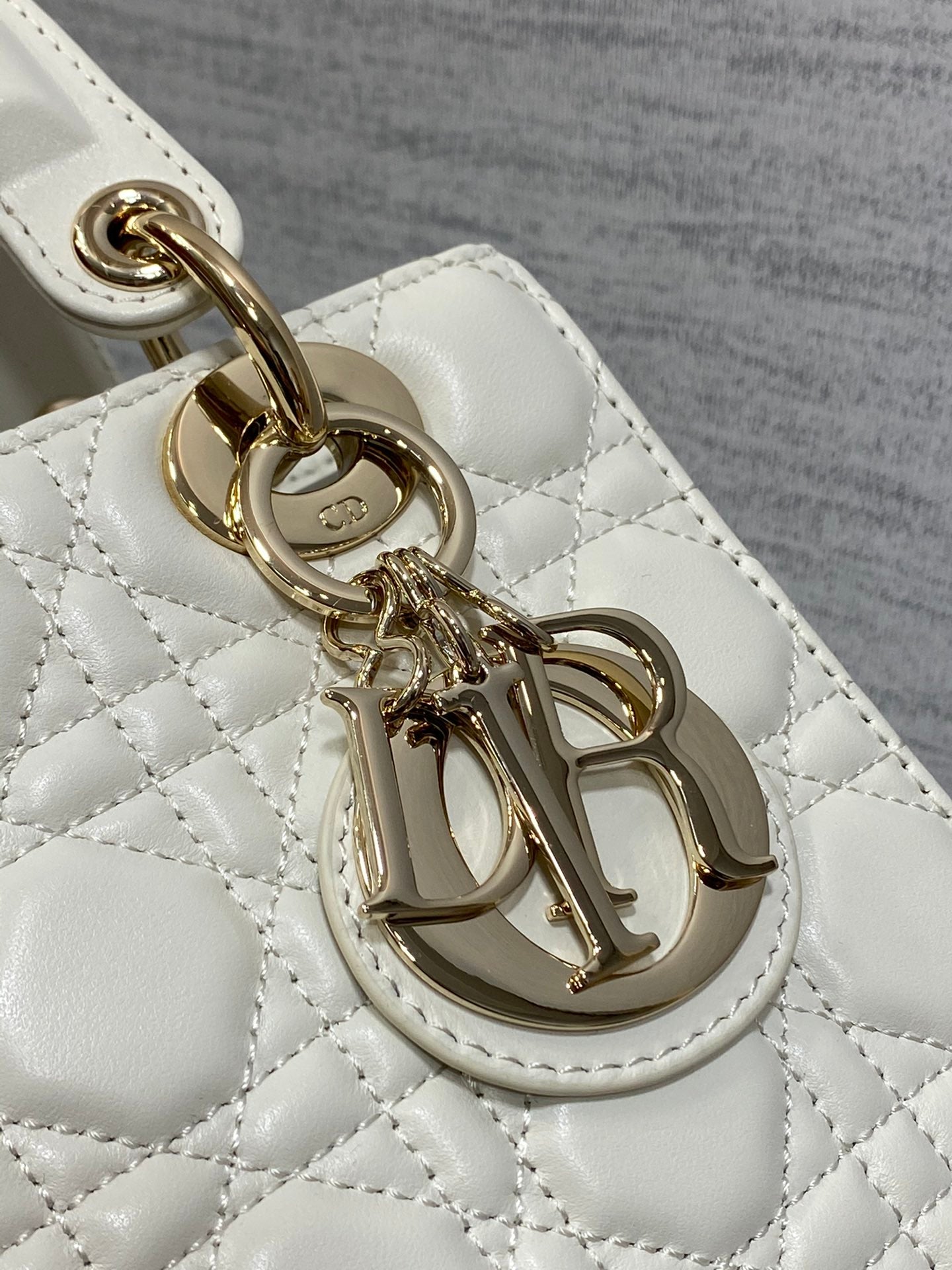 Dior Elegant White Quilted Leather Handbag with Gold-Tone Accents