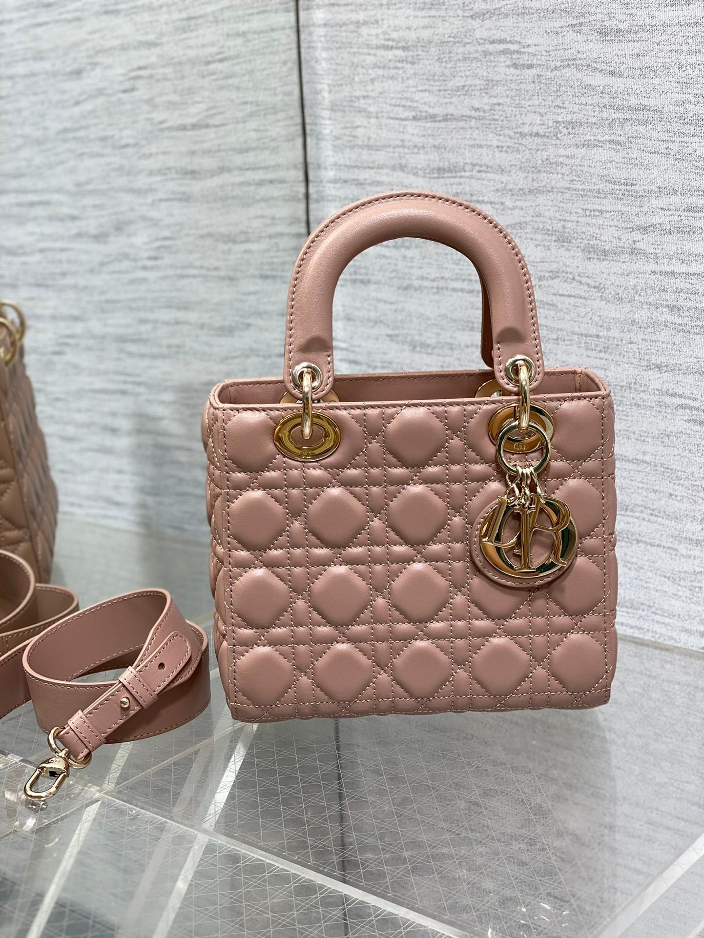 Dior Elegant Nude Pink Quilted Leather Handbag with Shoulder Strap