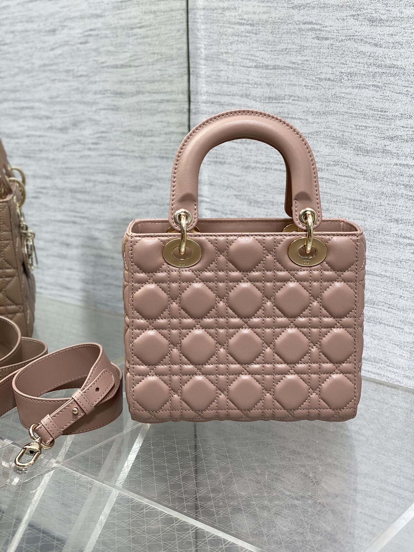 Dior Elegant Nude Pink Quilted Leather Handbag with Shoulder Strap