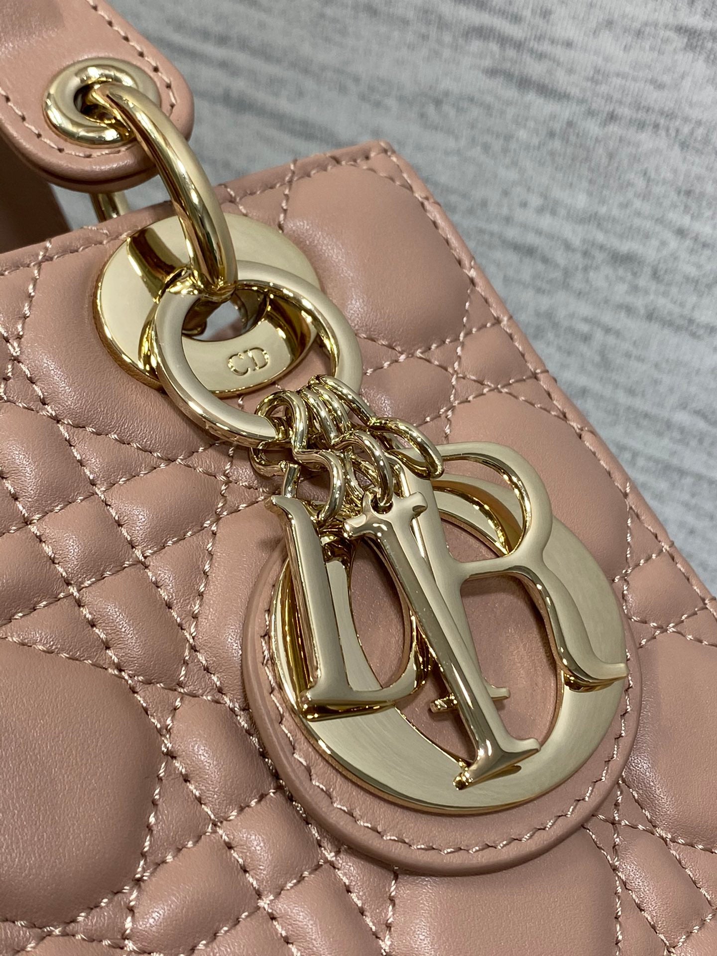 Dior Elegant Pink Quilted Leather Crossbody Bag with Top Handle
