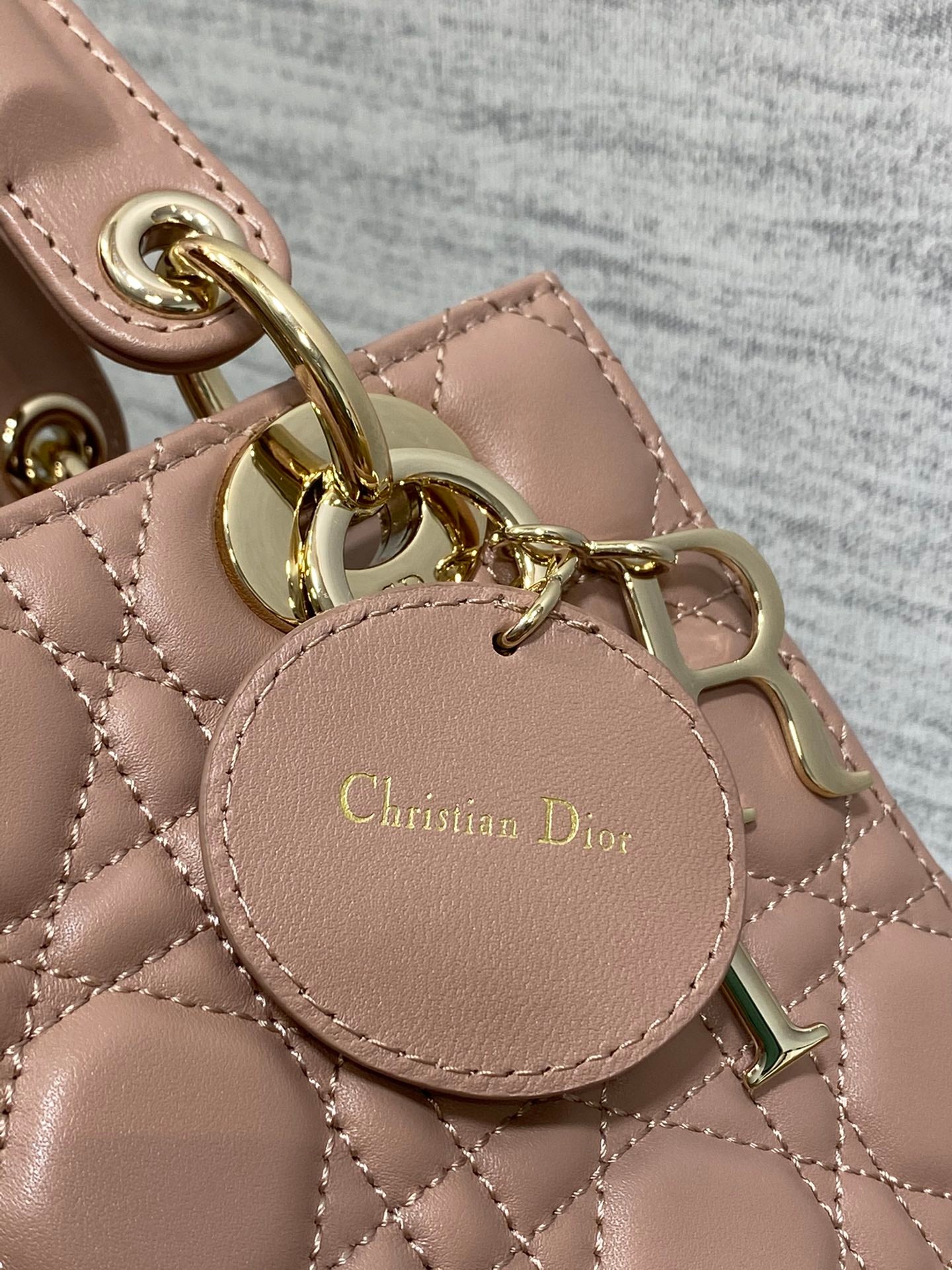 Dior Elegant Pink Quilted Leather Crossbody Bag with Top Handle