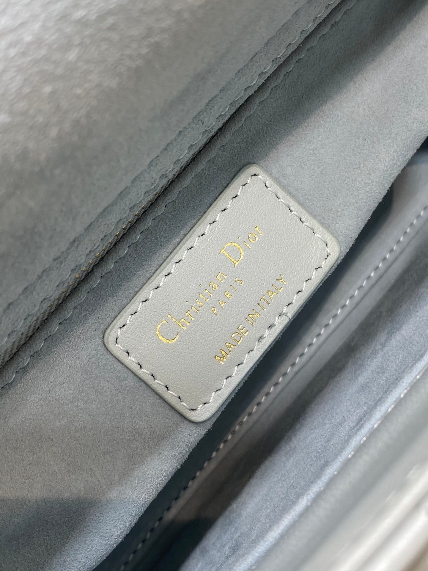 Dior Elegant Light Blue Quilted Leather Handbag with Crossbody Strap