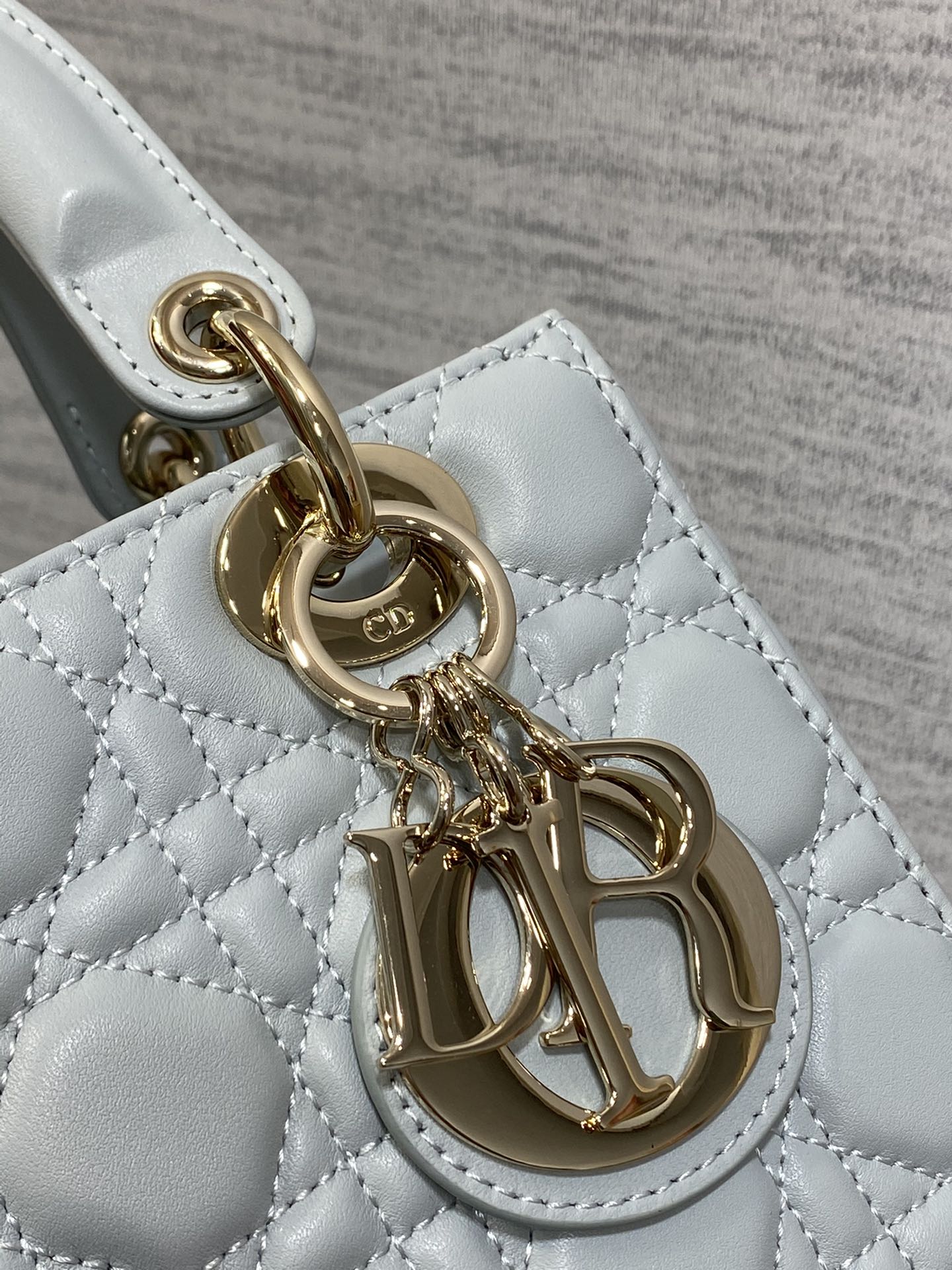 Dior Light Blue Quilted Leather Top Handle Handbag with Crossbody Strap