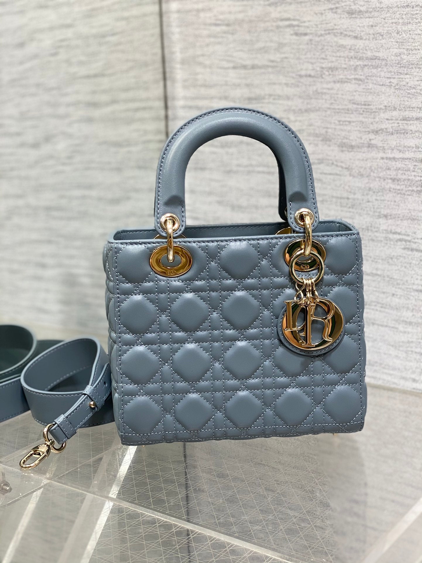 Dior Elegant Dusty Blue Quilted Leather Handbag with Top Handle