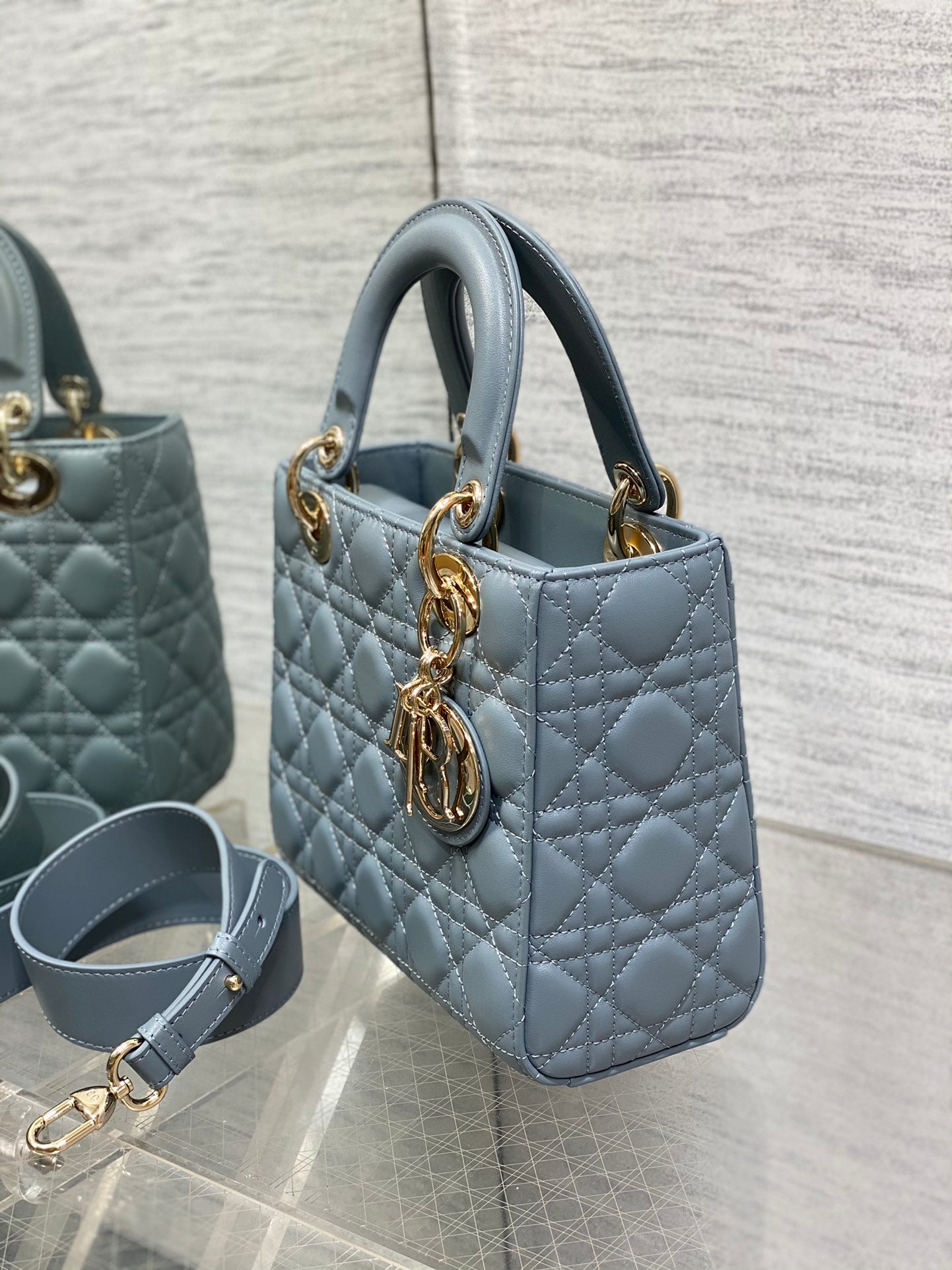 Dior Elegant Dusty Blue Quilted Leather Handbag with Top Handle