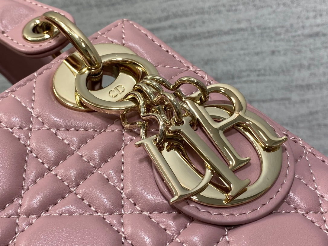 Dior Elegant Pink Quilted Mini Handbag with Gold Chain Crossbody Strap