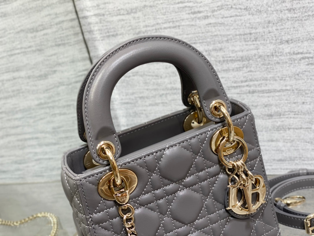 Dior Elegant Grey Quilted Leather Mini Handbag with Gold Chain Strap