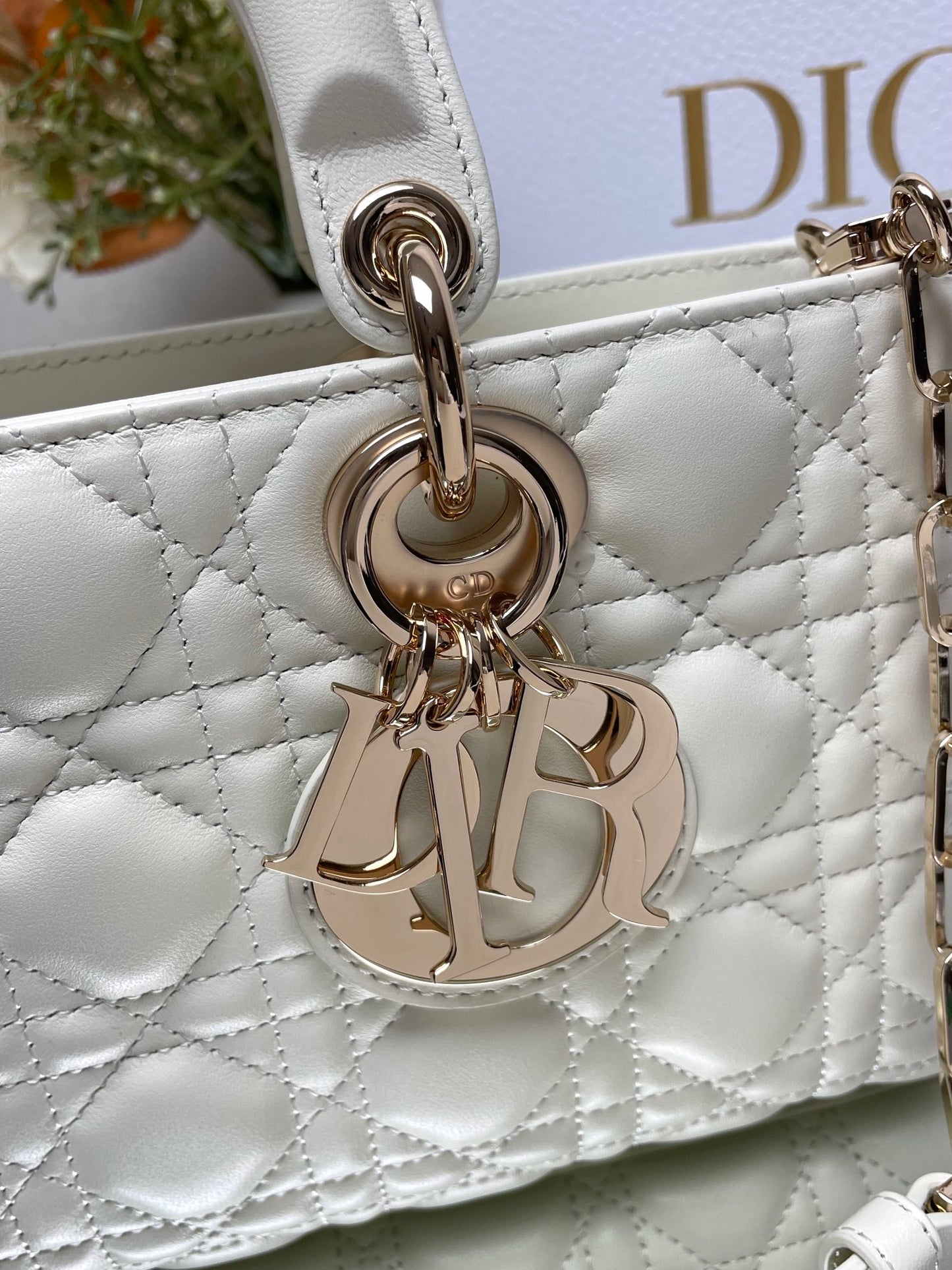 Dior Elegant White Quilted Leather Top Handle Bag with Gold Chain Strap