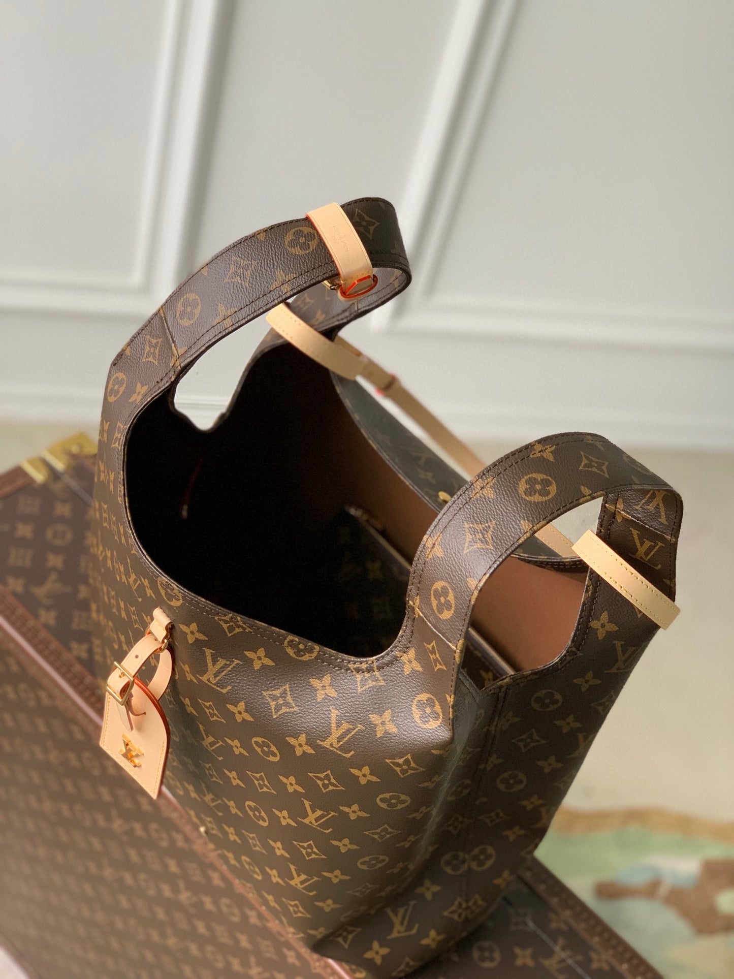 Louis Vuitton Brown Monogram Asymmetric Canvas Triangle Hobo Bag