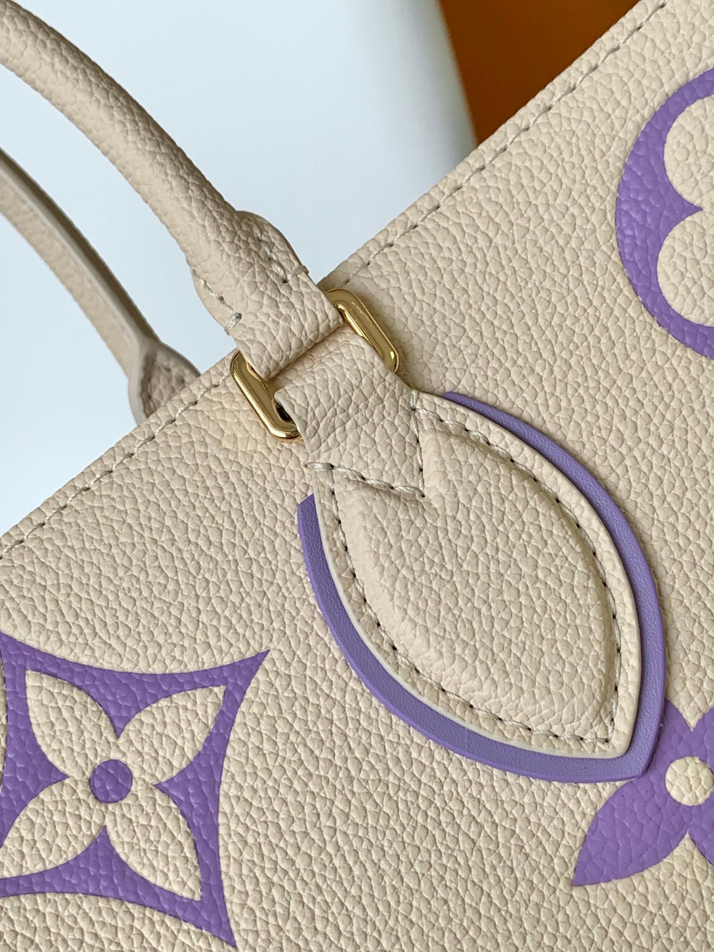 Louis Vuitton Elegant Cream Leather Tote Bag with Purple Monogram Print