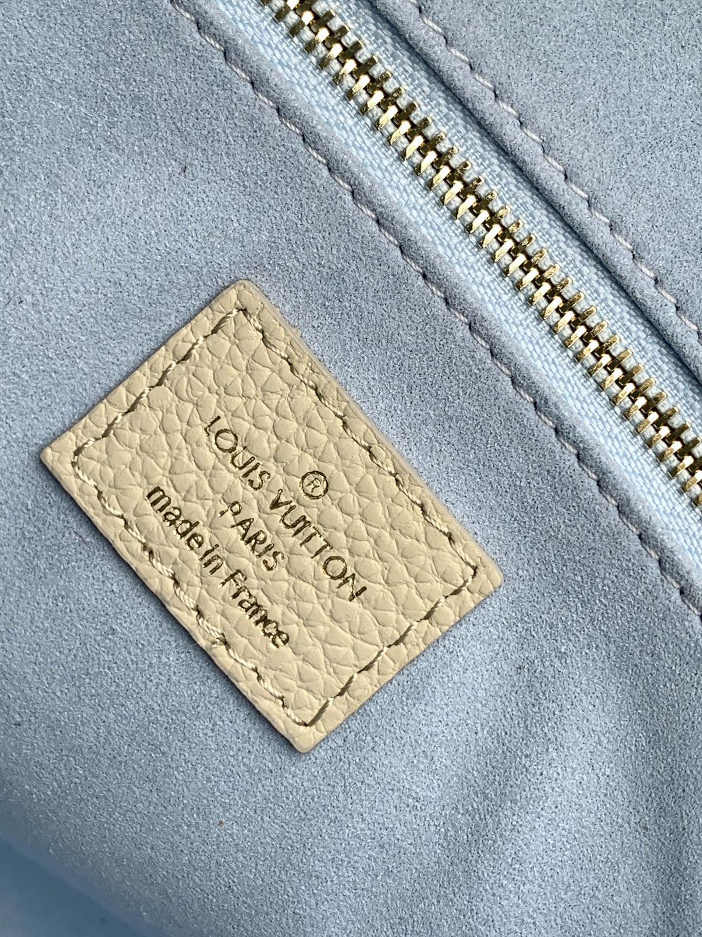 Louis Vuitton Chic Cream and Pastel Blue Monogram Embossed Leather Tote Handbag
