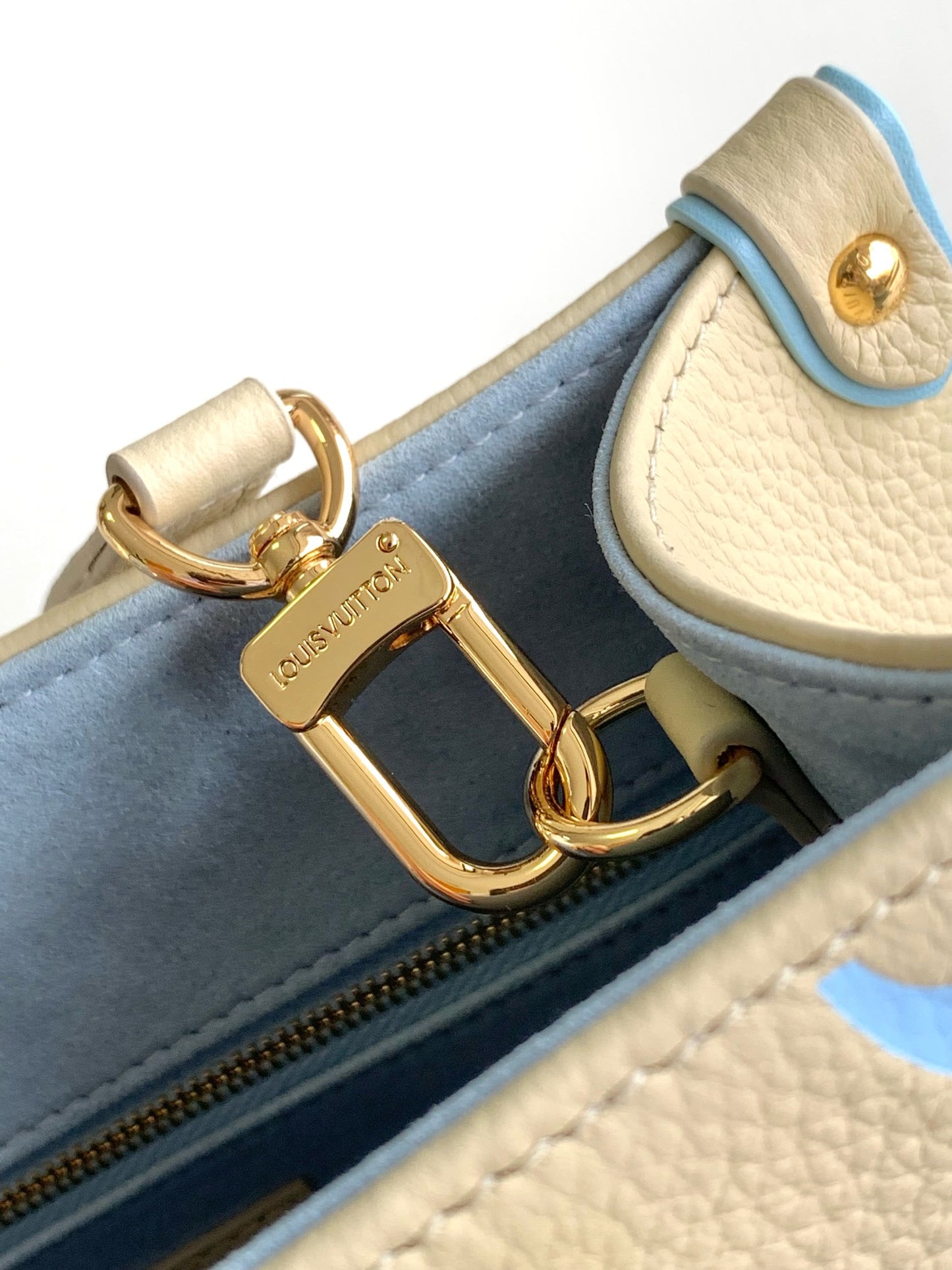 Louis Vuitton Chic Cream and Pastel Blue Monogram Embossed Leather Tote Handbag