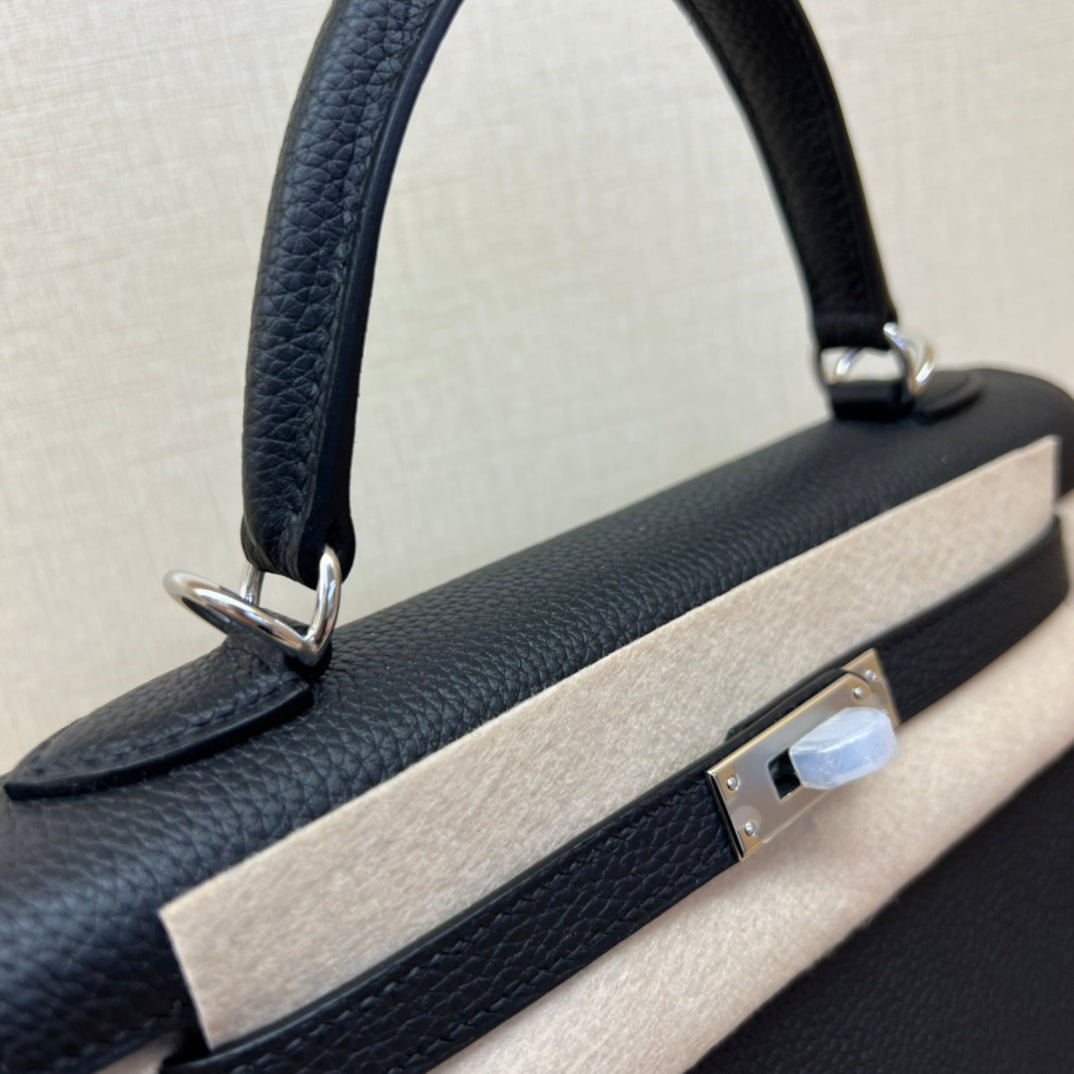 Luxury Black and Beige Top Handle Leather Handbag - Elegant Designer Style