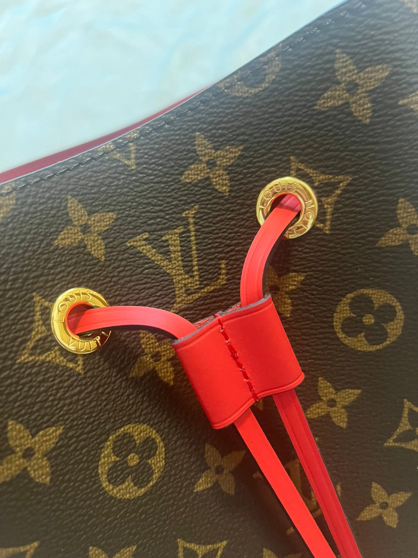 Louis Vuitton Brown Monogram Canvas Drawstring Bucket Bag with Red Strap