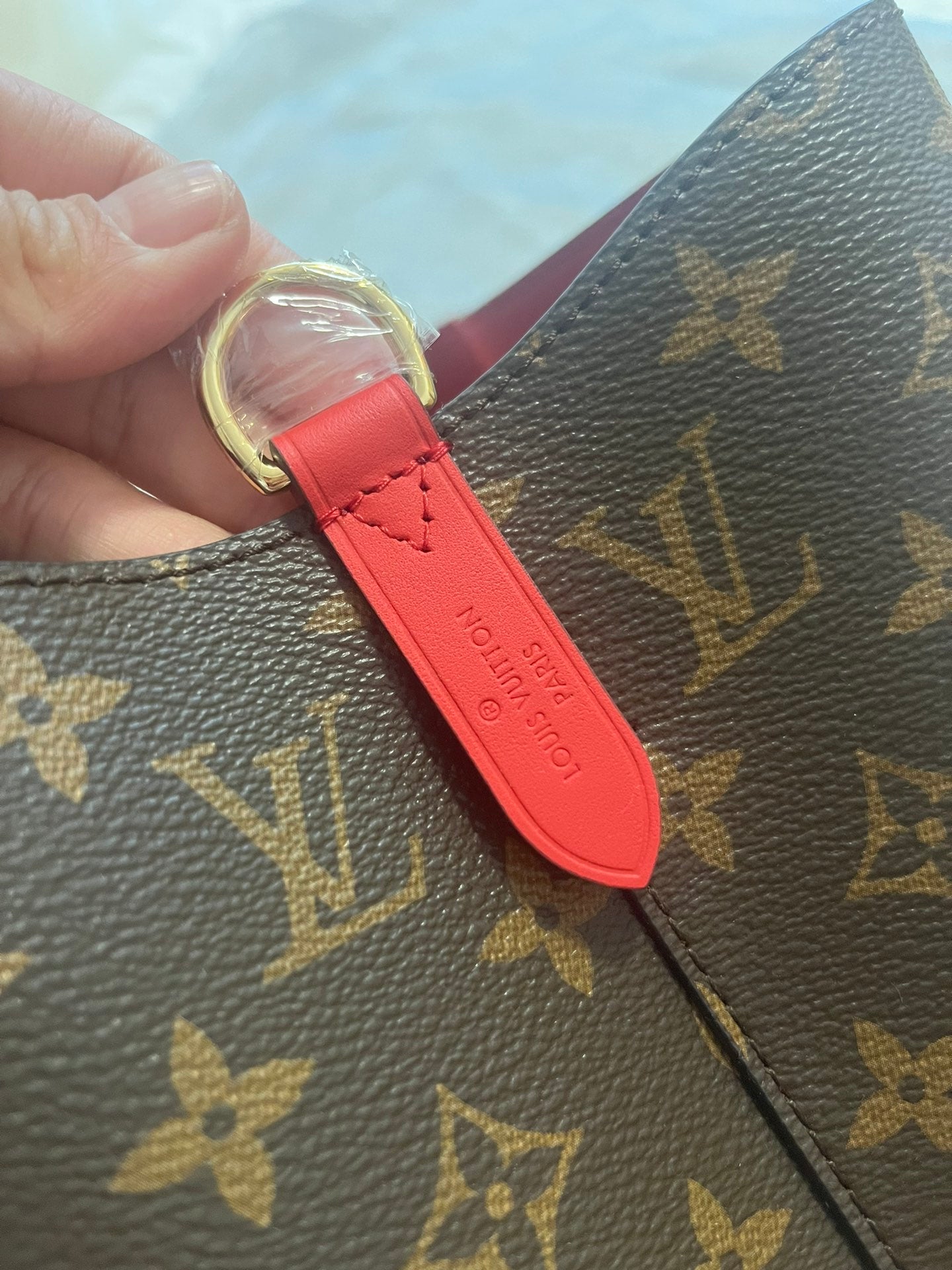 Louis Vuitton Brown Monogram Canvas Drawstring Bucket Bag with Red Strap