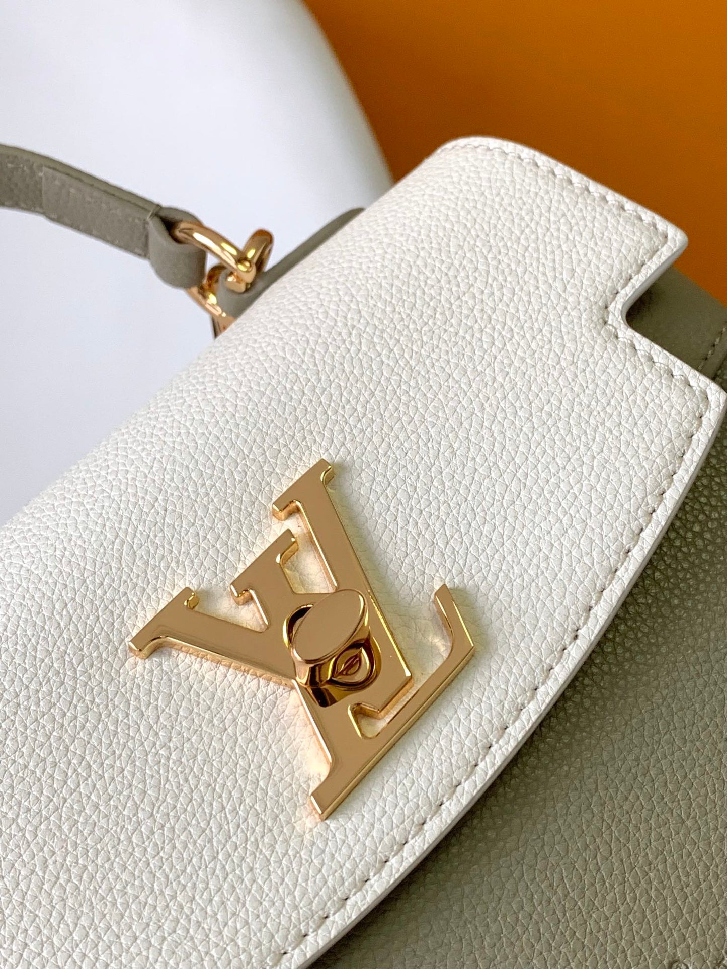 Louis Vuitton Elegant Sage Green and Cream Leather Top Handle Handbag with Gold Clasp