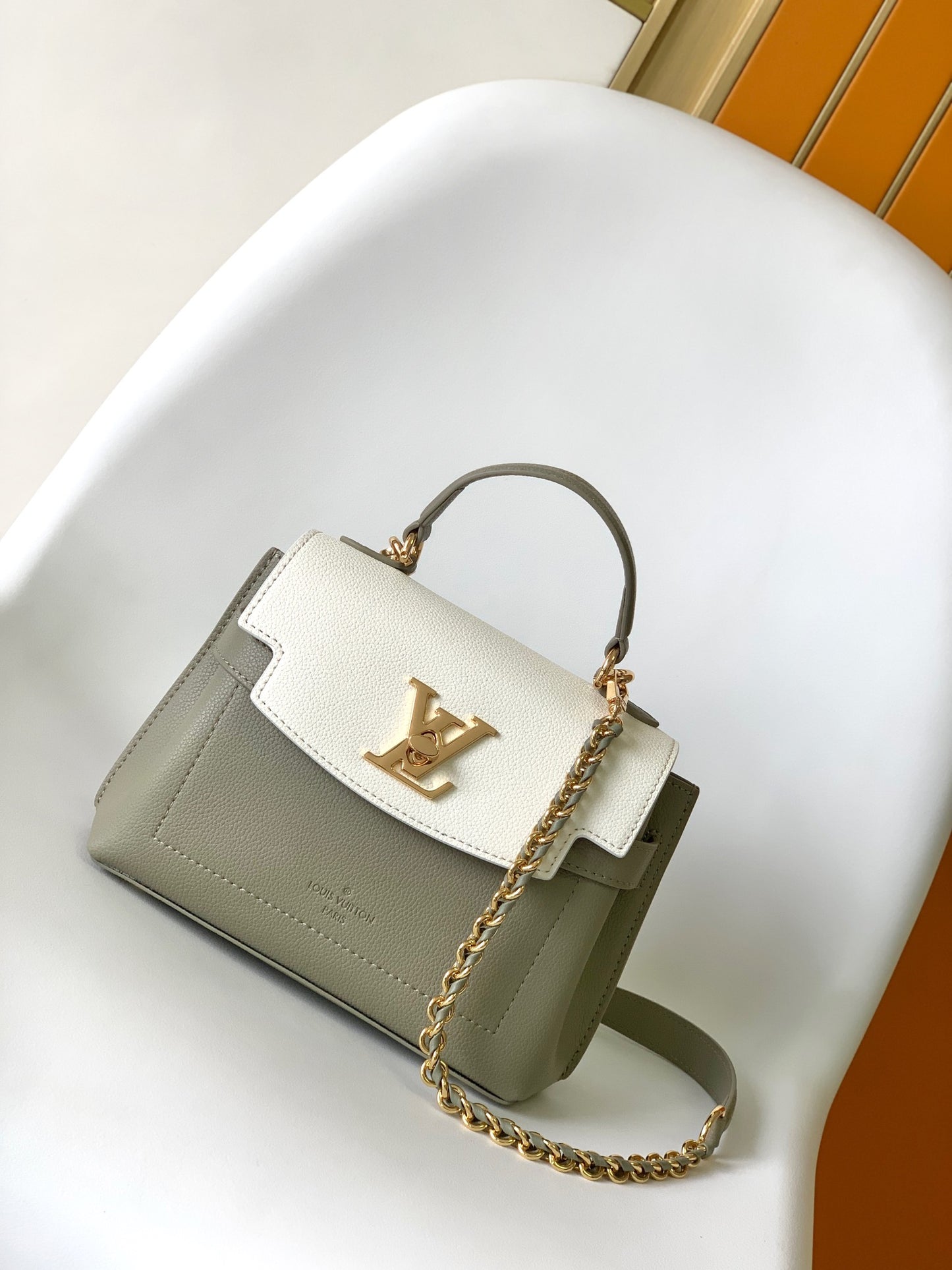 Louis Vuitton Elegant Sage Green and Cream Leather Top Handle Handbag with Gold Clasp
