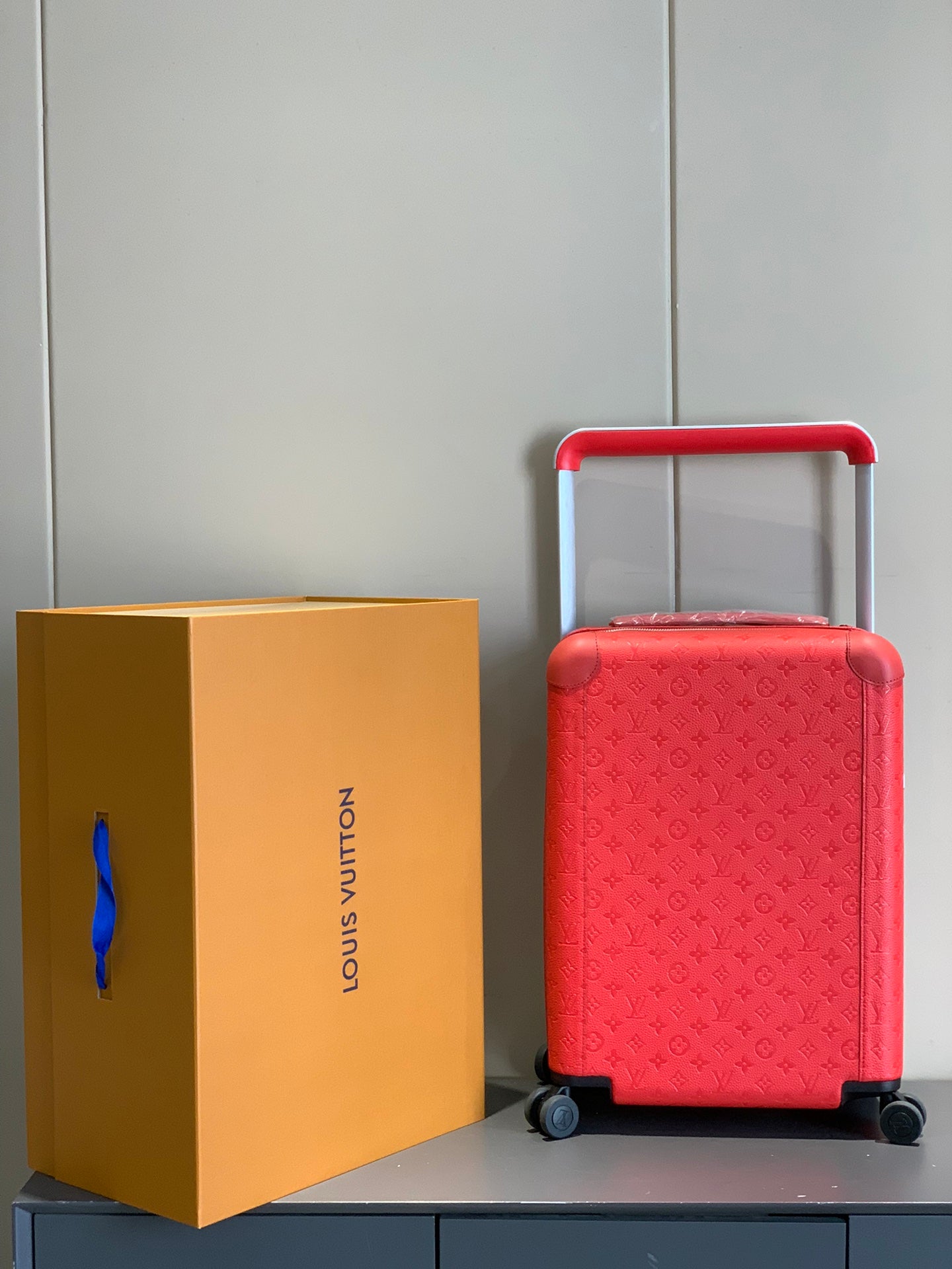 Red Monogram Embossed Hardshell Rolling Suitcase Travel Luggage