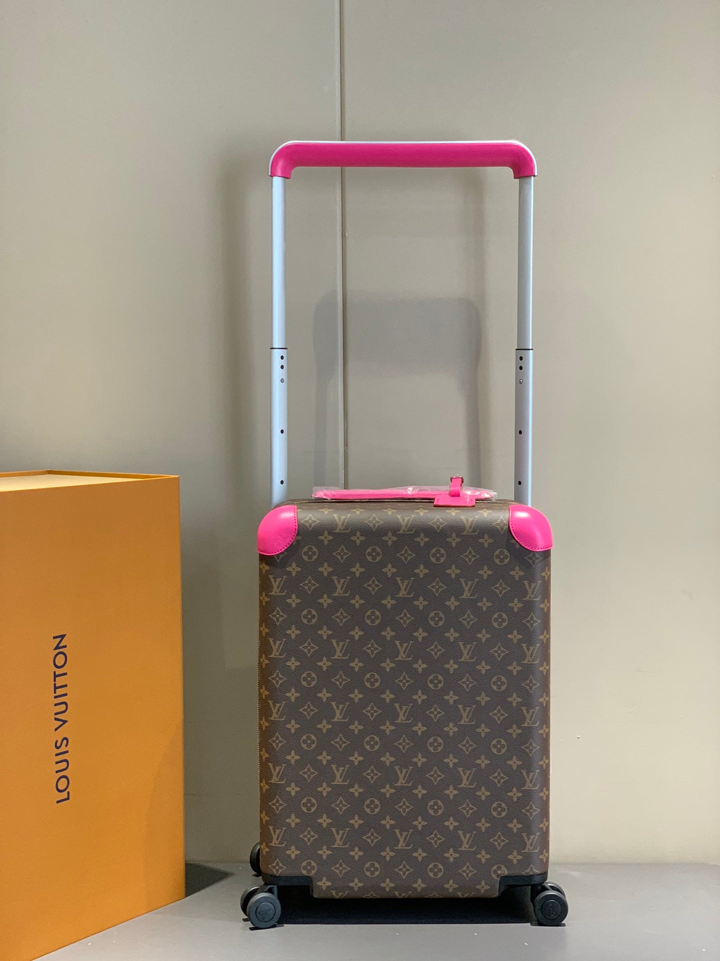 Brown Monogram Carry-On Suitcase with Hot Pink Handle and Wheels
