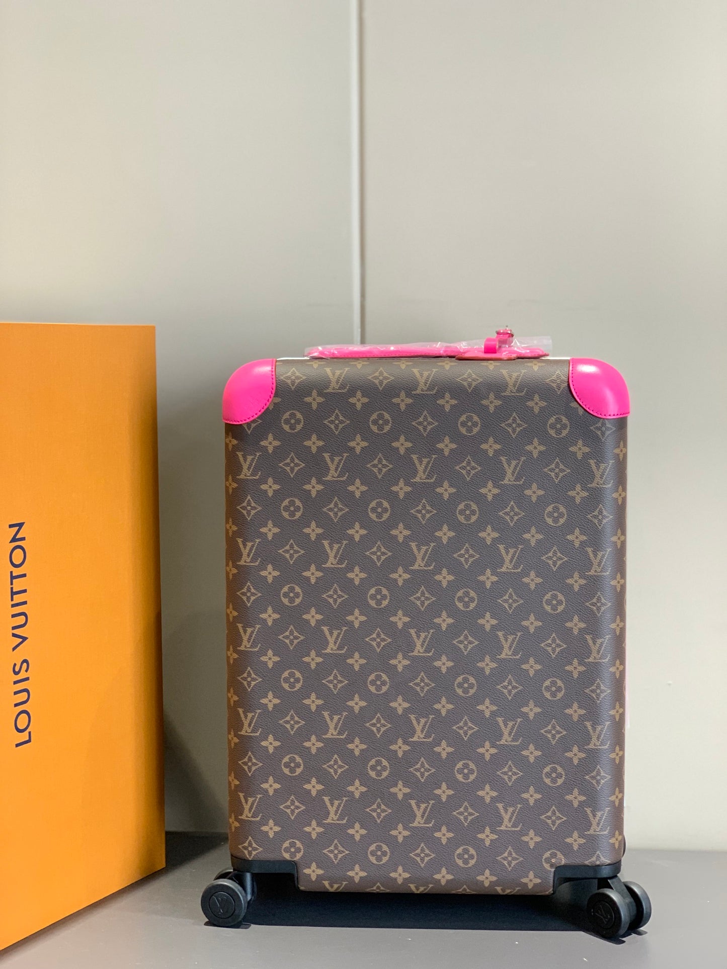 Brown Monogram Carry-On Suitcase with Hot Pink Handle and Wheels