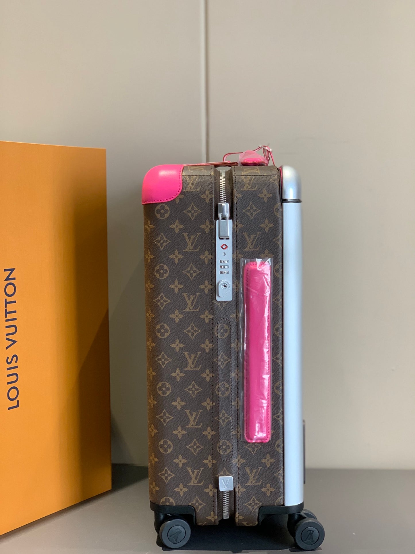 Brown Monogram Carry-On Suitcase with Hot Pink Handle and Wheels