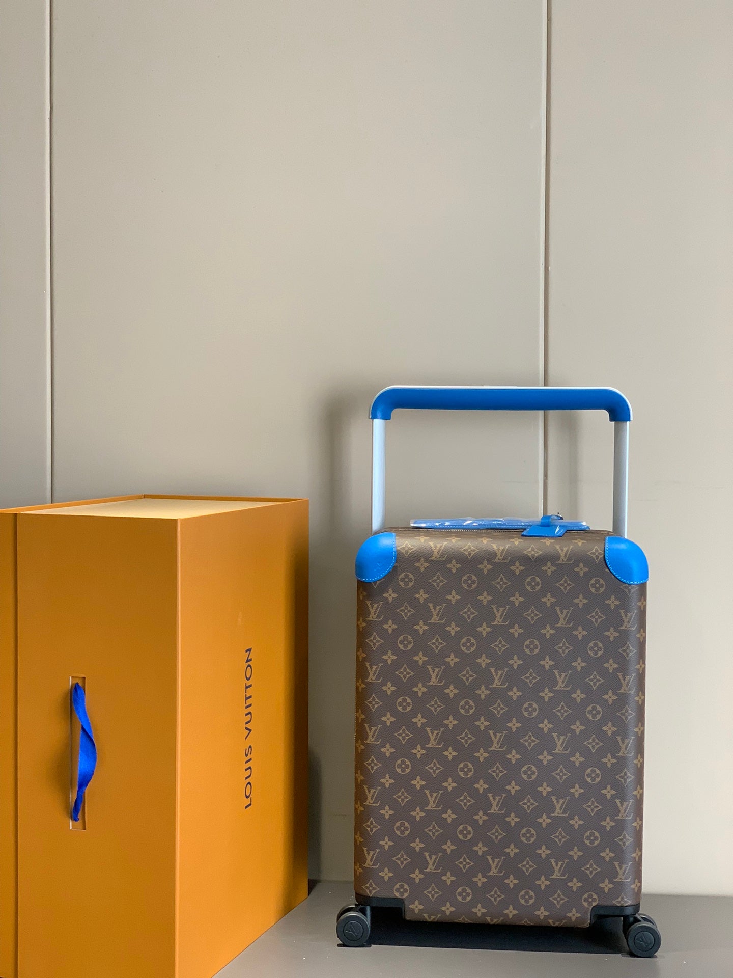 Retro Brown Monogram Spinner Suitcase with Blue Leather Trim