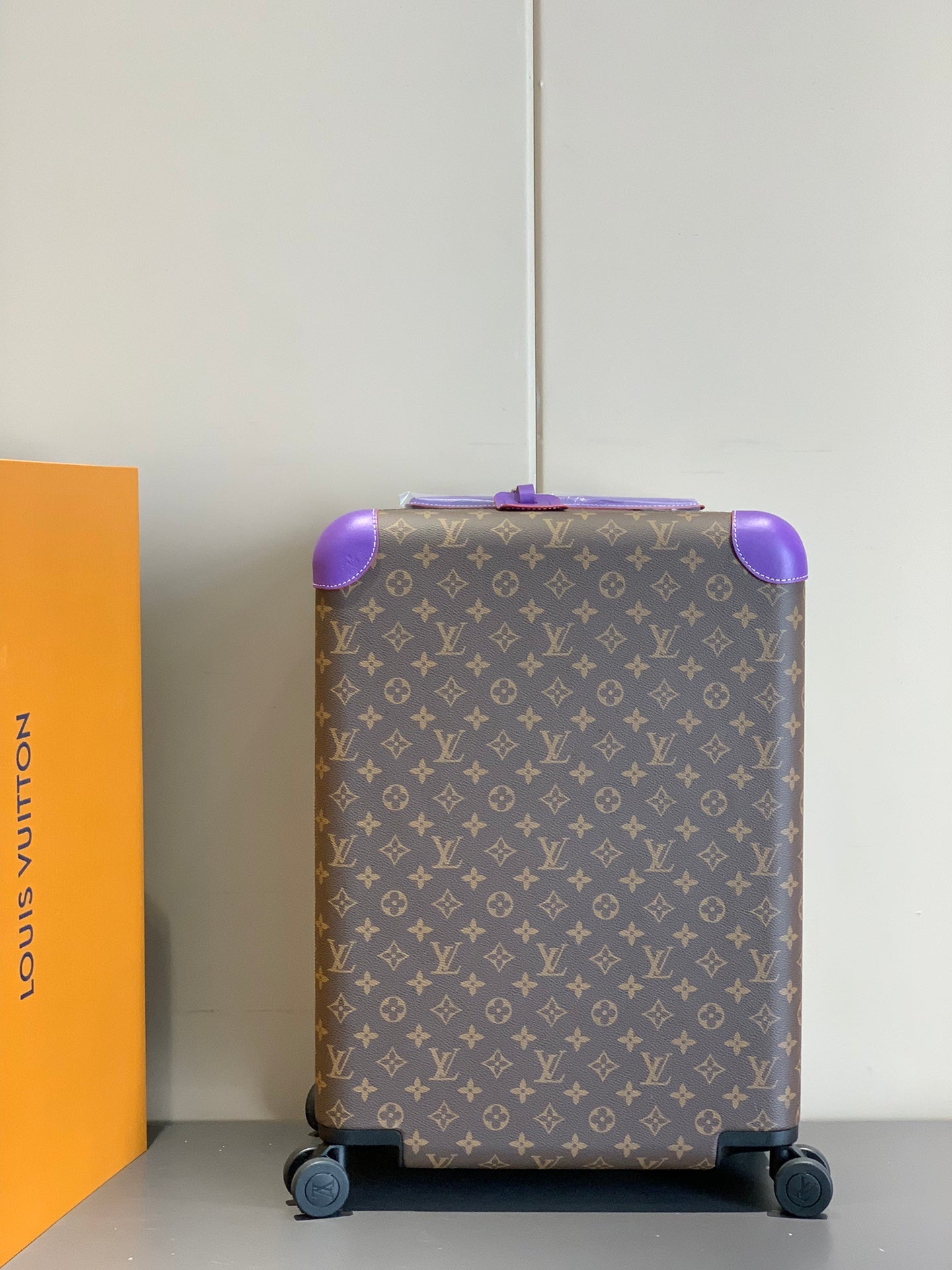 Luxury Brown Monogram Rolling Suitcase with Purple Accents