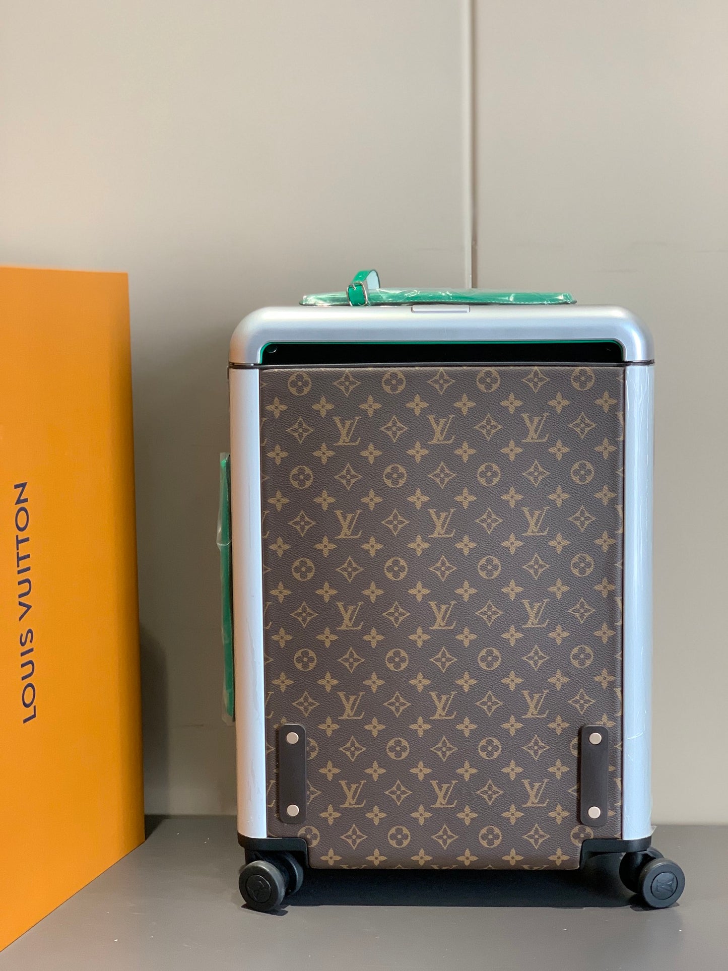 Brown Monogram Rolling Suitcase with Green Handle and Spinner Wheels