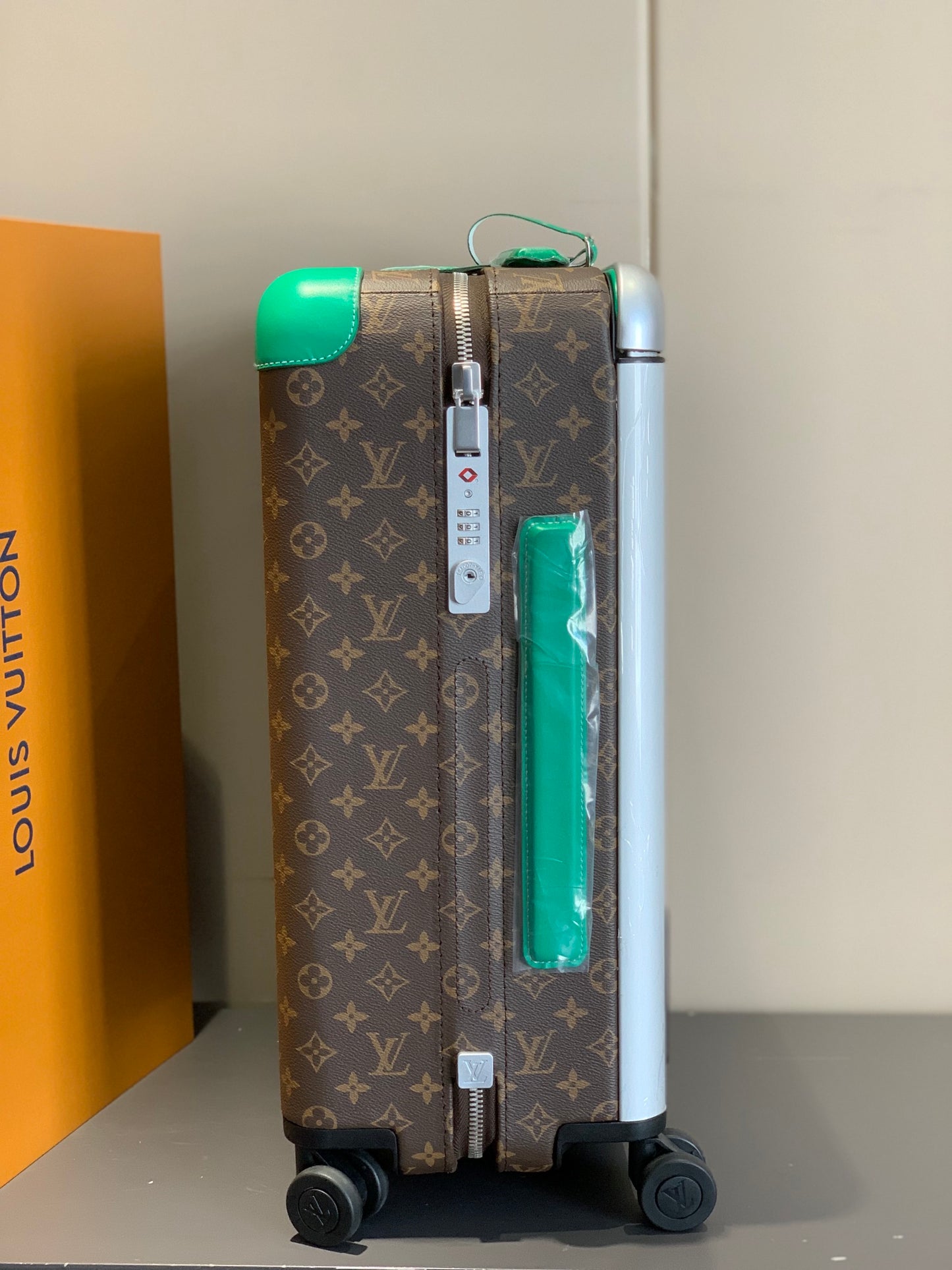 Brown Monogram Rolling Suitcase with Green Handle and Spinner Wheels