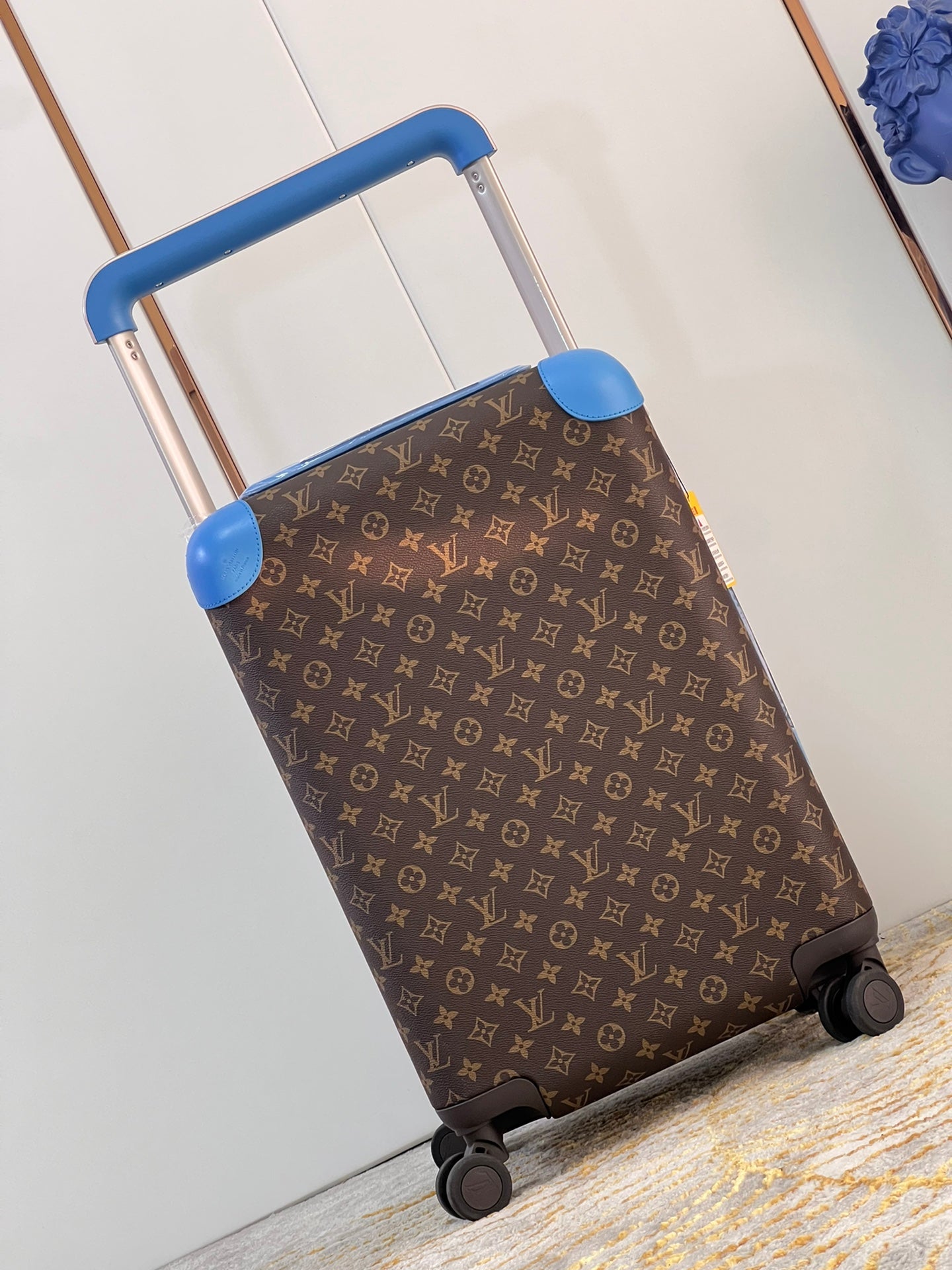 Classic Brown Monogram Rolling Suitcase with Blue Accents