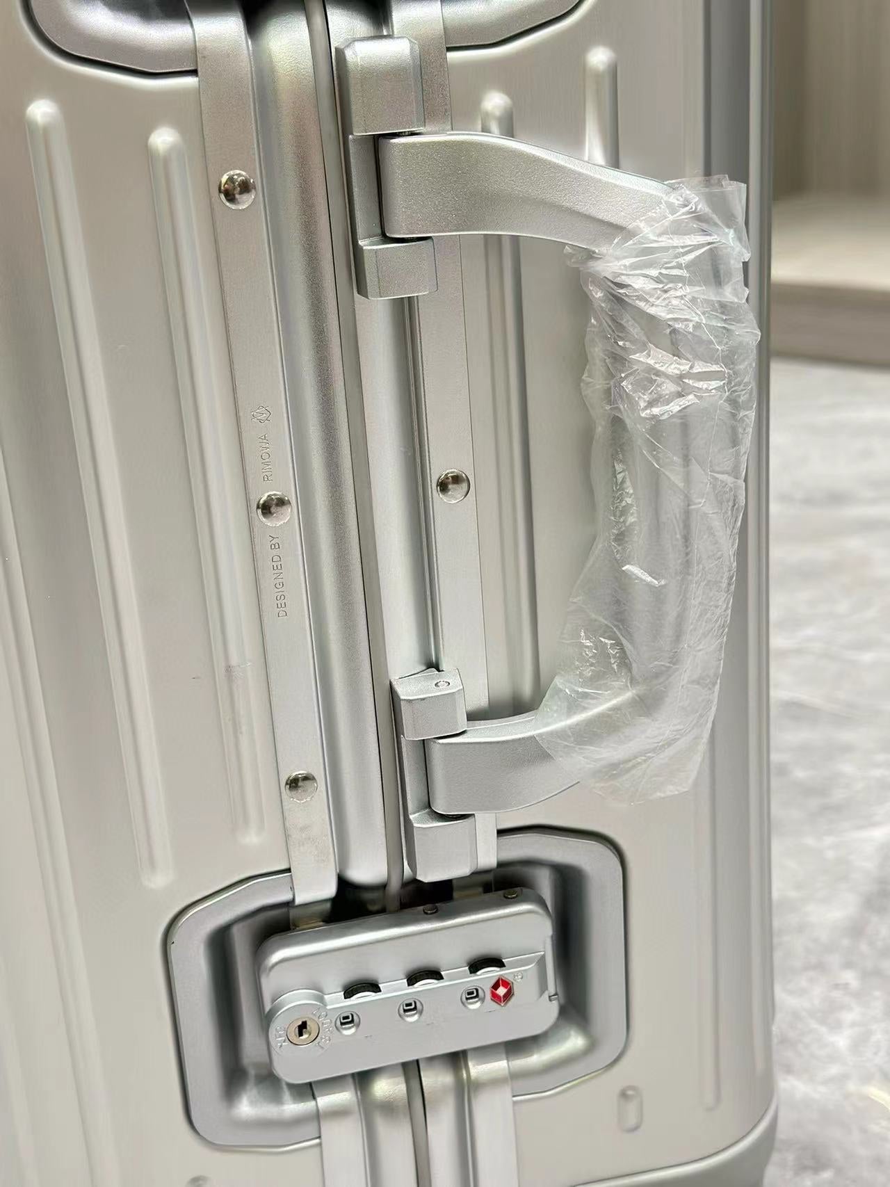 Grooved Hardside Silver Spinner Carry-On Luggage Suitcase