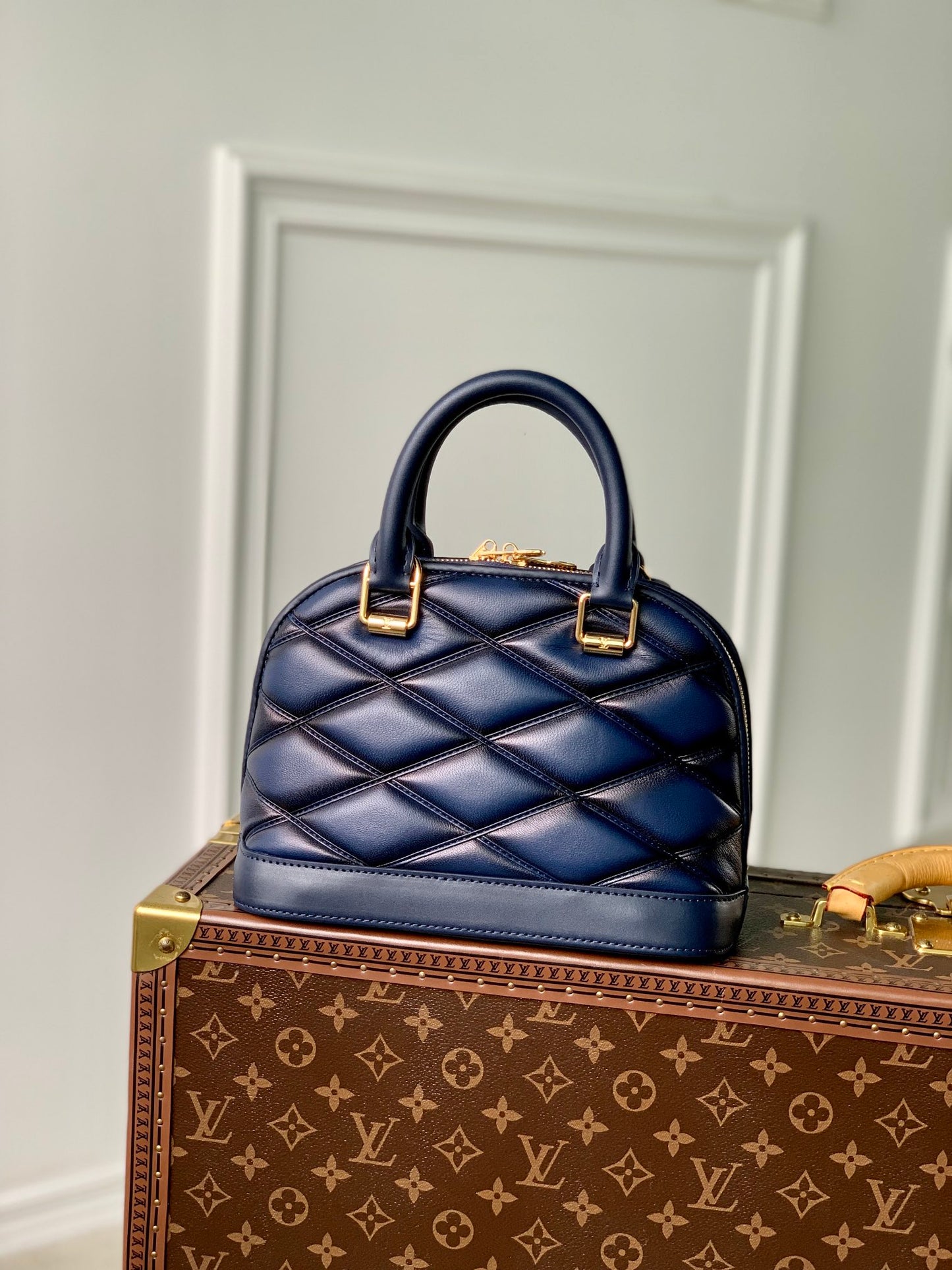 Louis Vuitton Elegant Navy Blue Quilted Leather Dome Handbag with Shoulder Strap