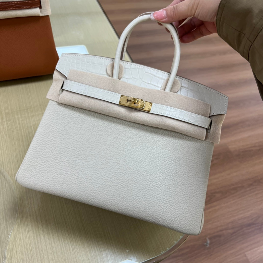Luxury White Leather Top Handle Handbag with Gold Clasp Detail