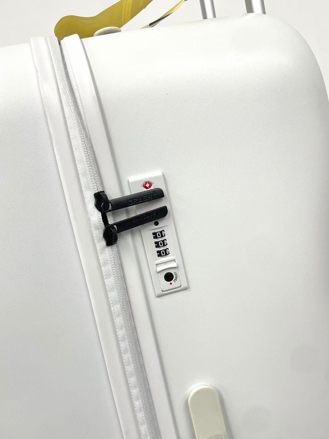 Modern Glossy White Dented Hardshell Spinner Suitcase