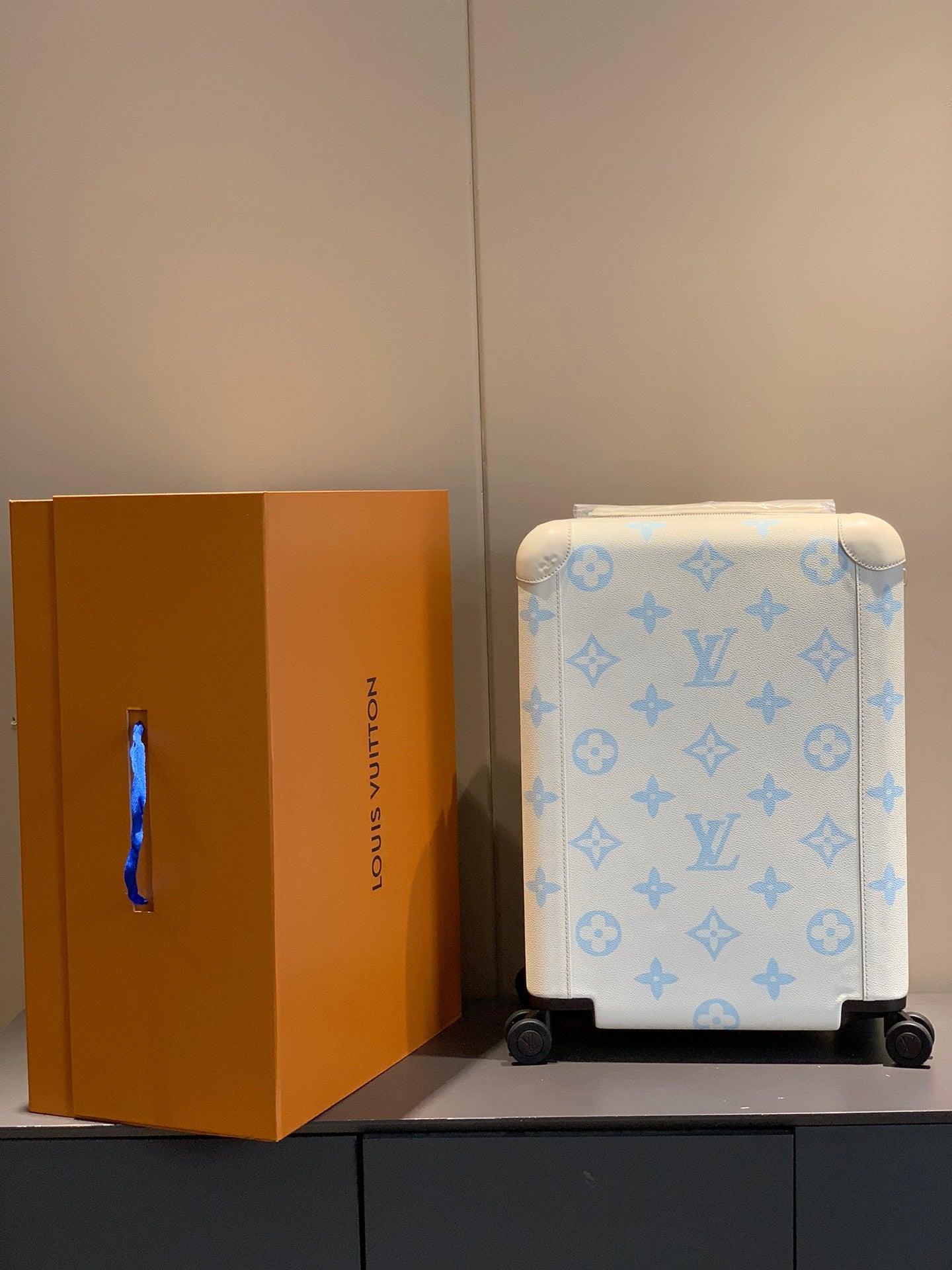 White and Light Blue Monogram Hardshell Rolling Carry-On Luggage