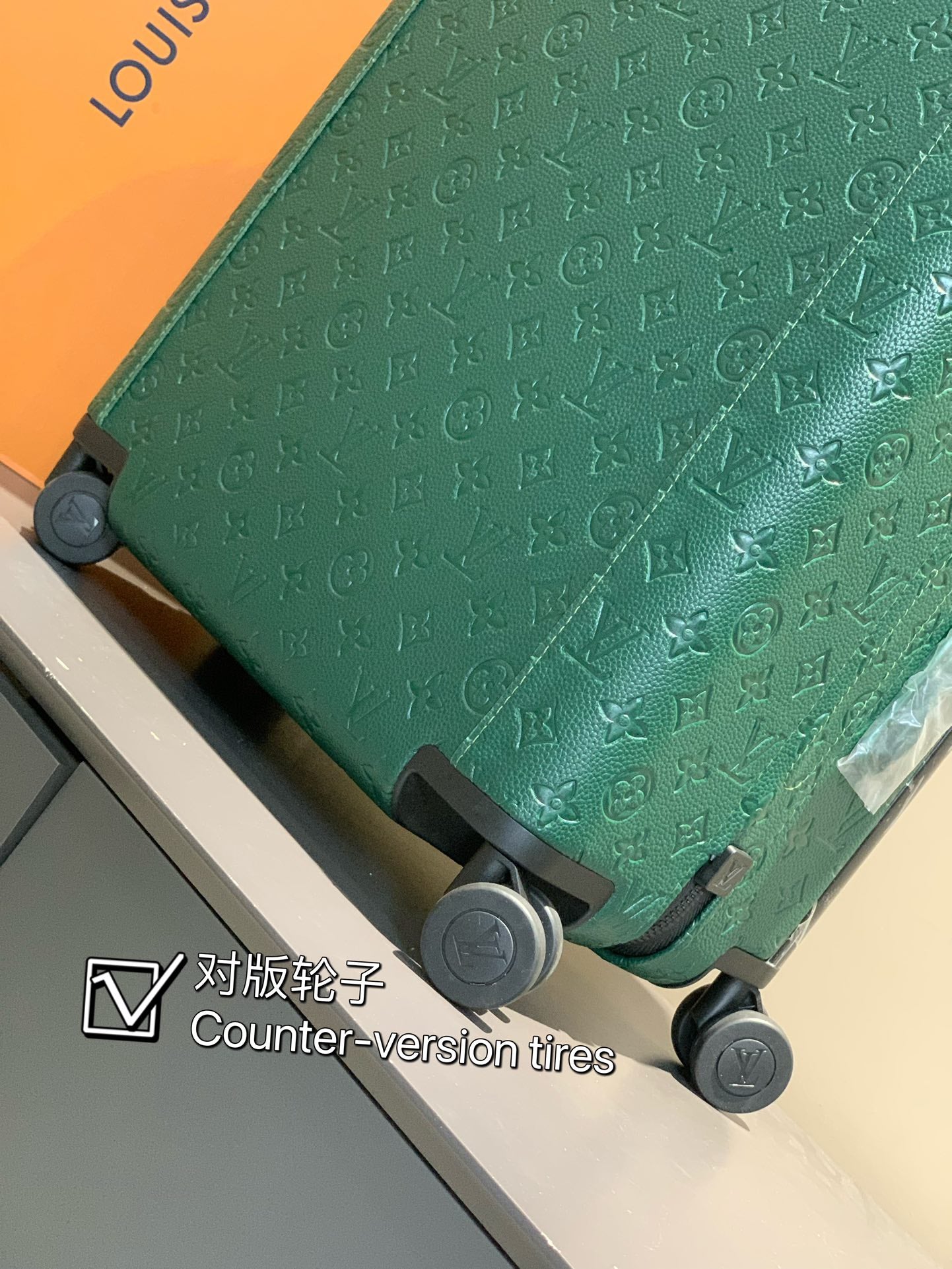 Emerald Green Monogram Embossed Hardside Spinner Suitcase