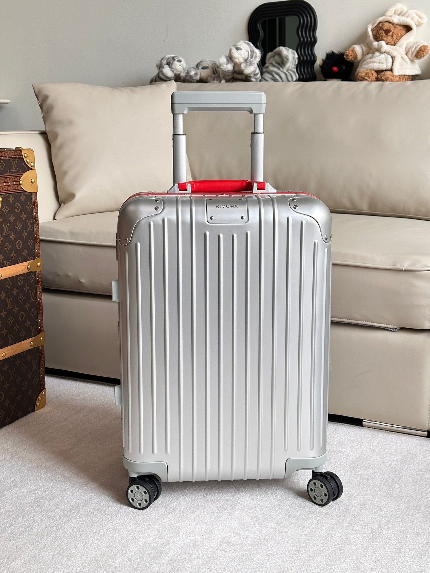Silver Ribbed Hardside Spinner Suitcase with Red Accent Handle