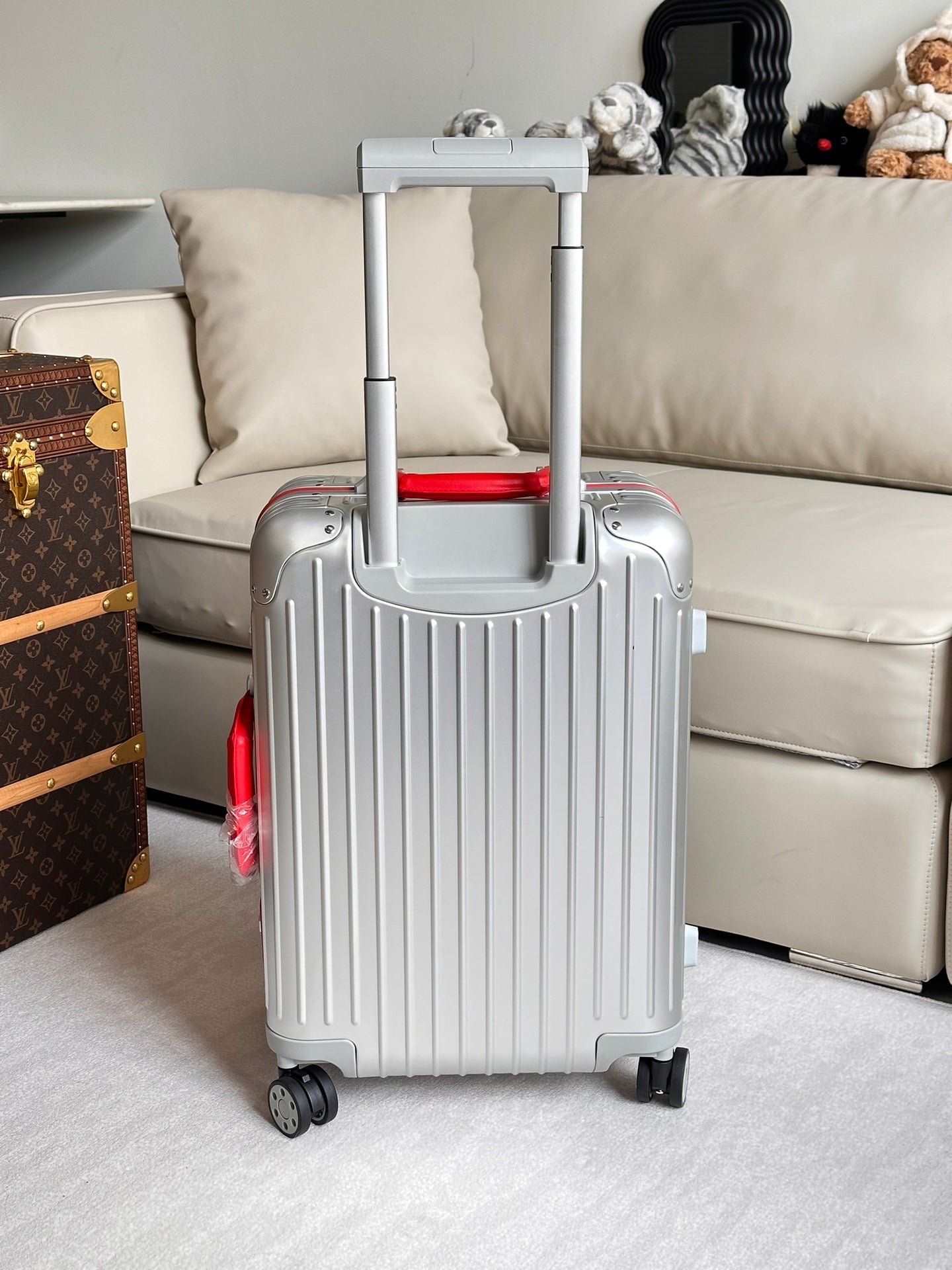 Silver Ribbed Hardside Spinner Suitcase with Red Accent Handle