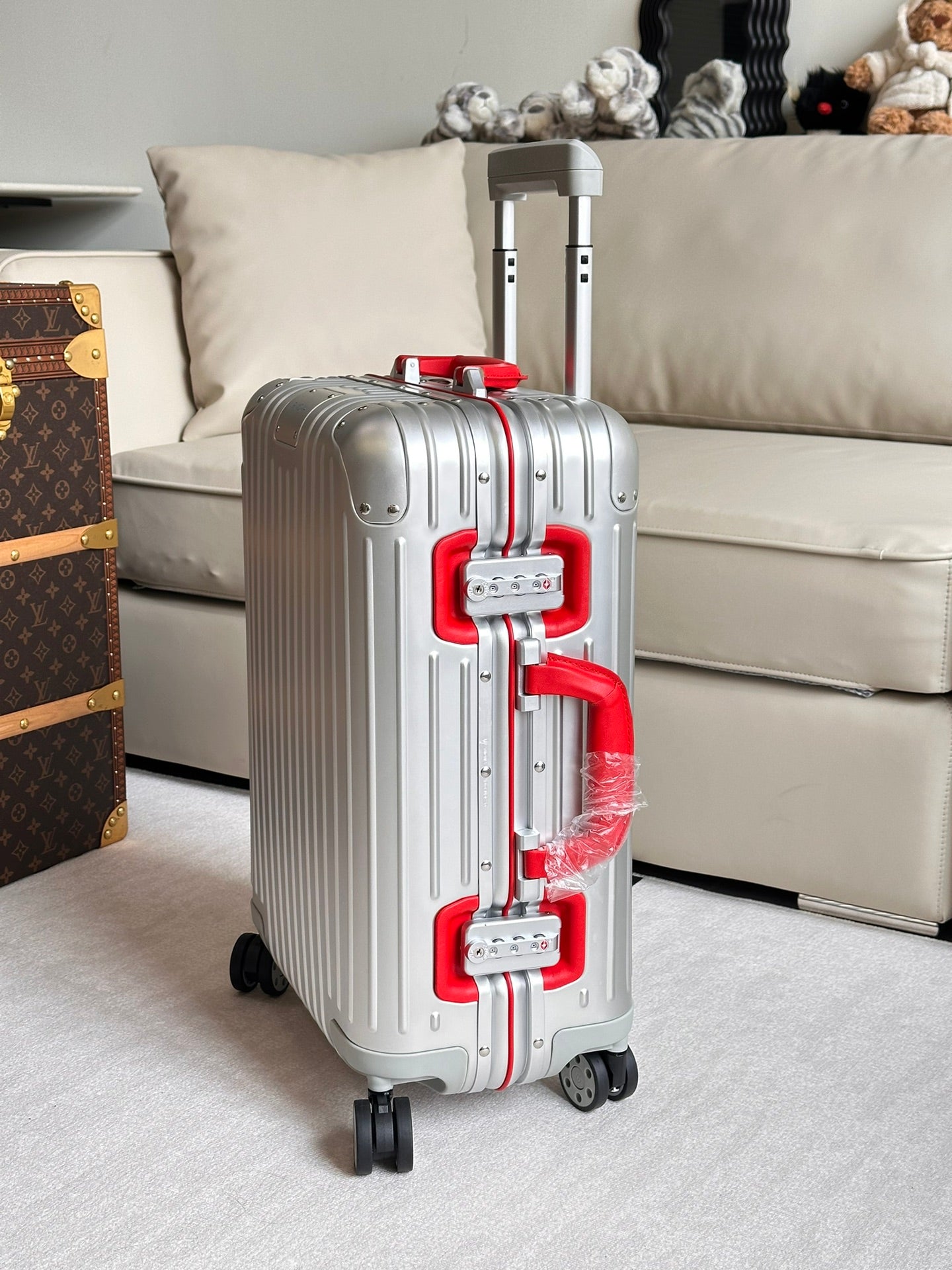 Silver Ribbed Hardside Spinner Suitcase with Red Accent Handle