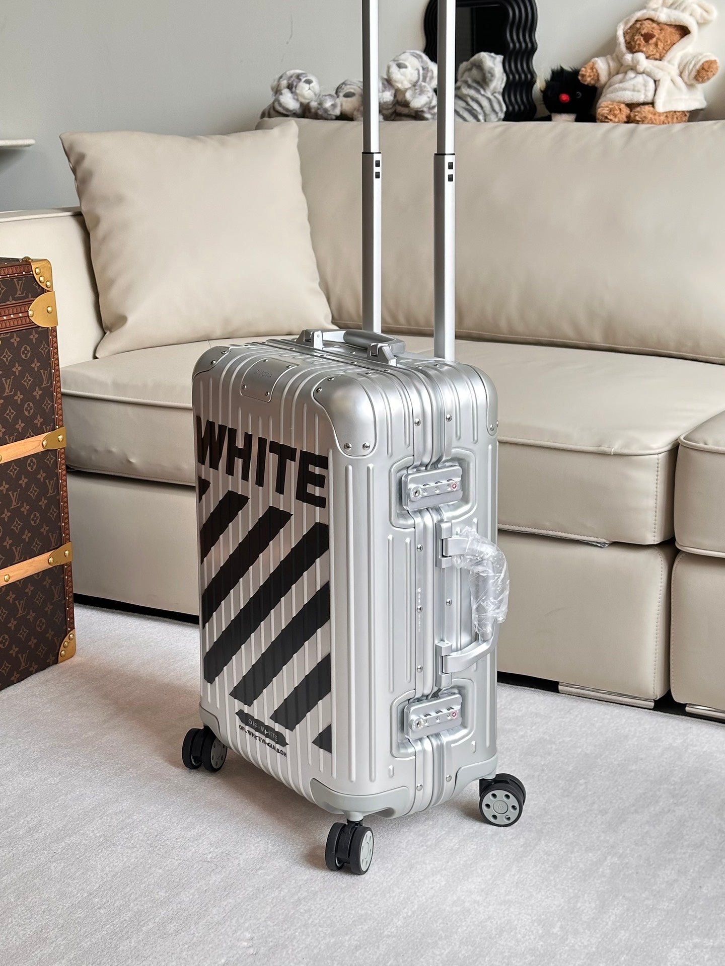 Silver Hardshell Carry-On Spinner Luggage with Black Diagonal Stripes