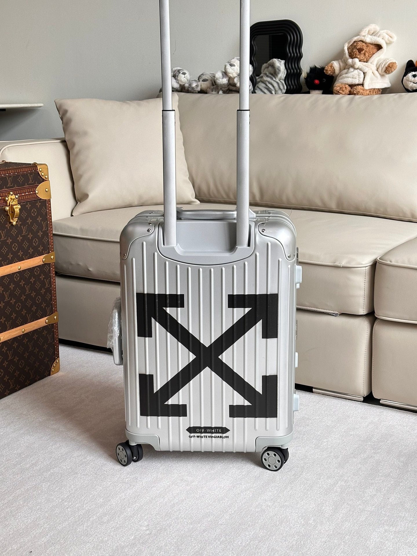 Silver Hardshell Carry-On Spinner Luggage with Black Diagonal Stripes