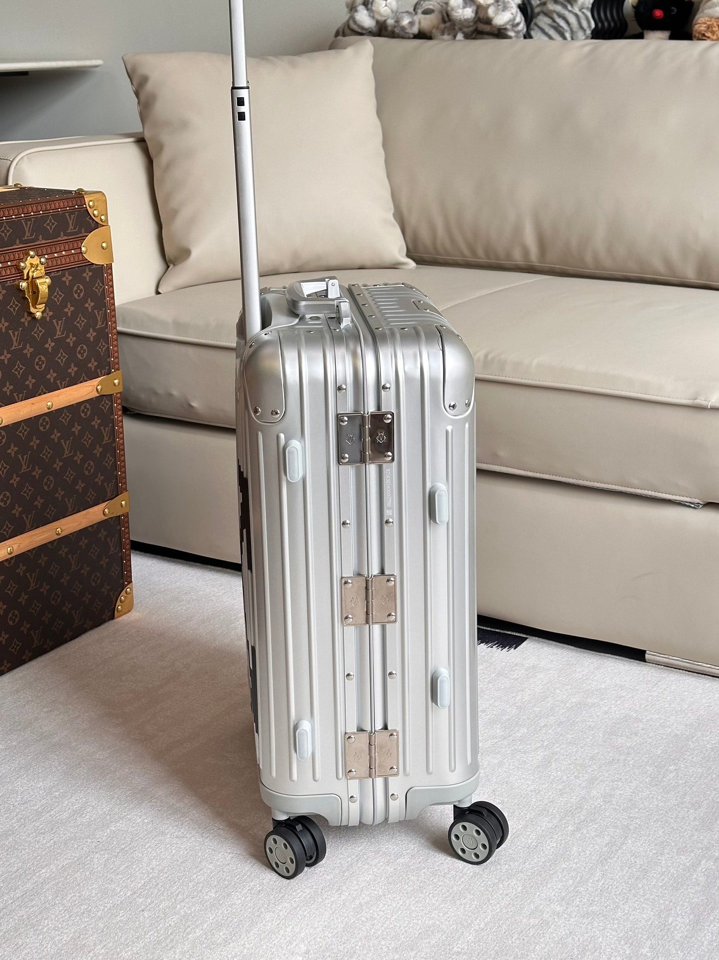 Silver Hardshell Carry-On Spinner Luggage with Black Diagonal Stripes