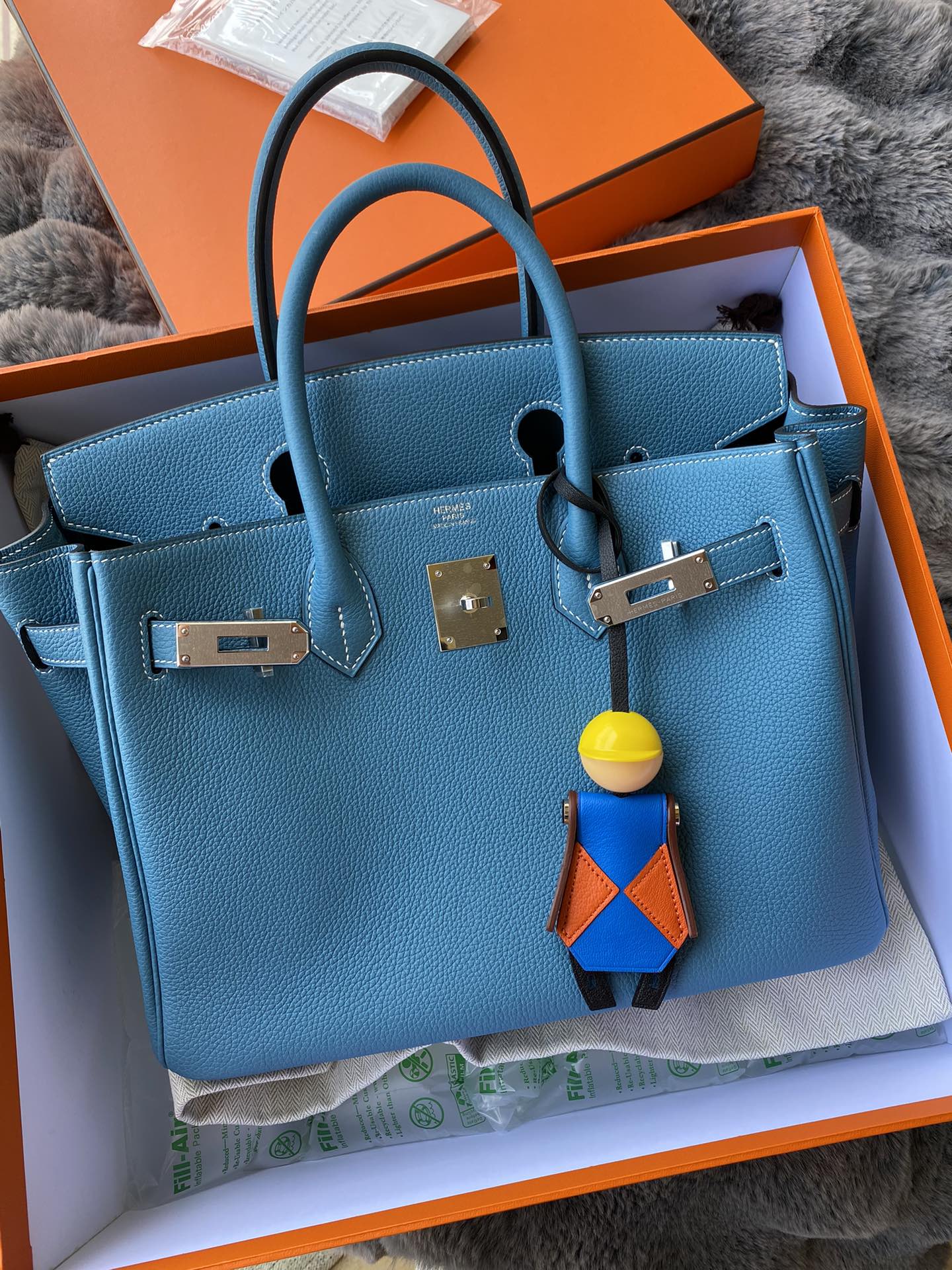 Hermès Birkin 25 Blue Leather Handbag with Palladium Hardware and Bag Charm
