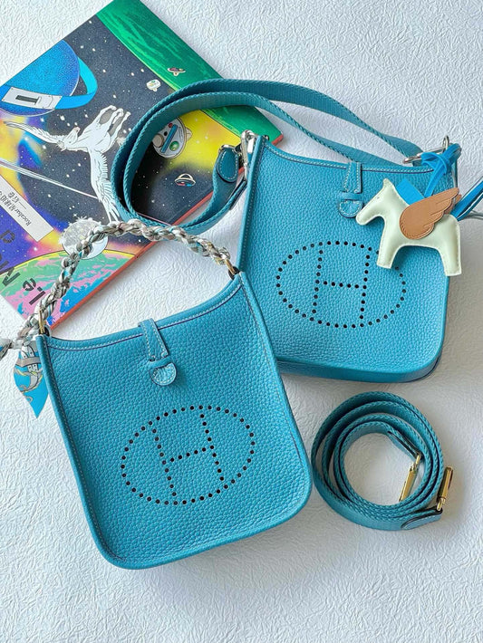 Turquoise Blue Perforated Leather Crossbody Bag with Pegasus Charm &amp; Chain Handle