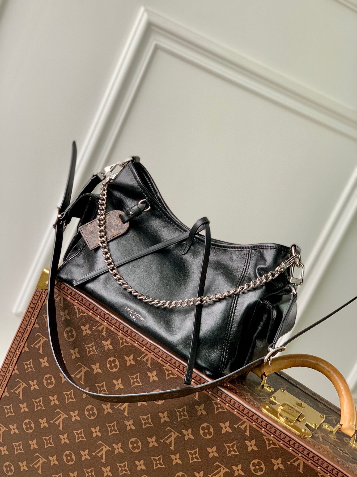 Louis Vuitton Slouchy Black Leather Shoulder Bag with Silver Chain Accent