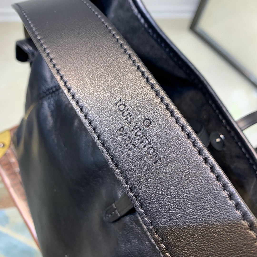 Louis Vuitton Slouchy Black Leather Shoulder Bag with Silver Chain Accent