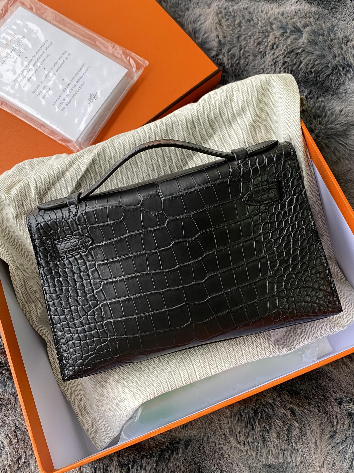 Hermès Kelly Cut Clutch Bag Black Shiny Niloticus Crocodile Palladium Hardware
