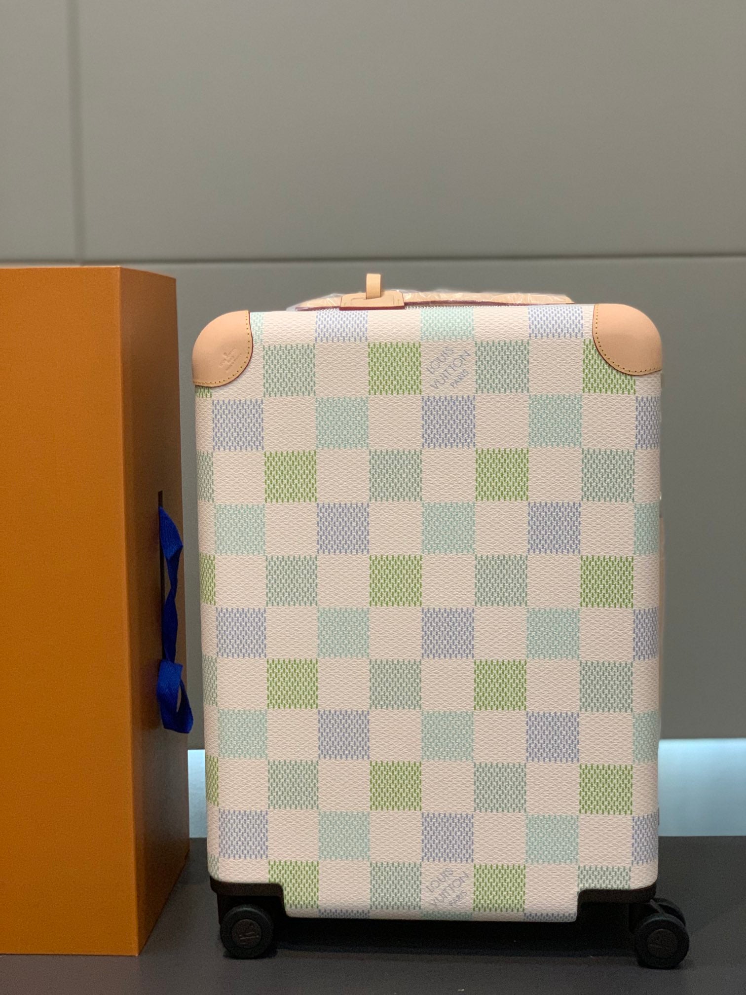 Pastel Checkerboard Rolling Suitcase with Leather Trim