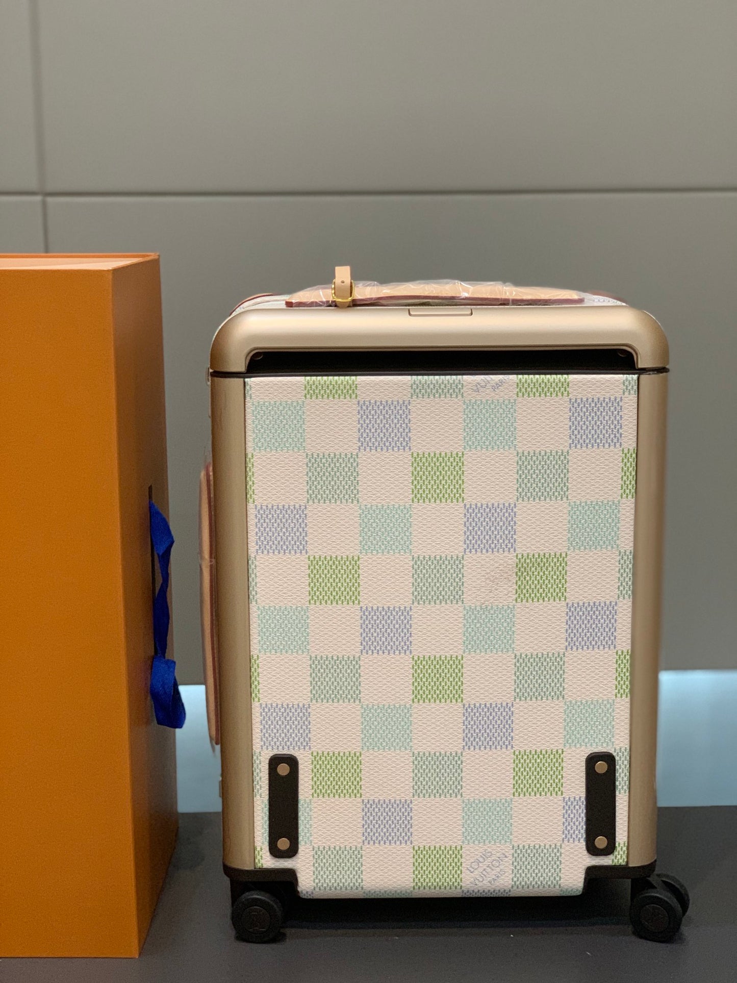 Pastel Checkerboard Rolling Suitcase with Leather Trim