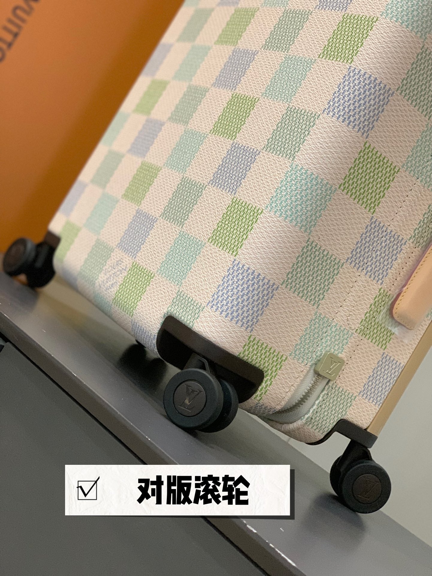 Pastel Checkerboard Rolling Suitcase with Leather Trim